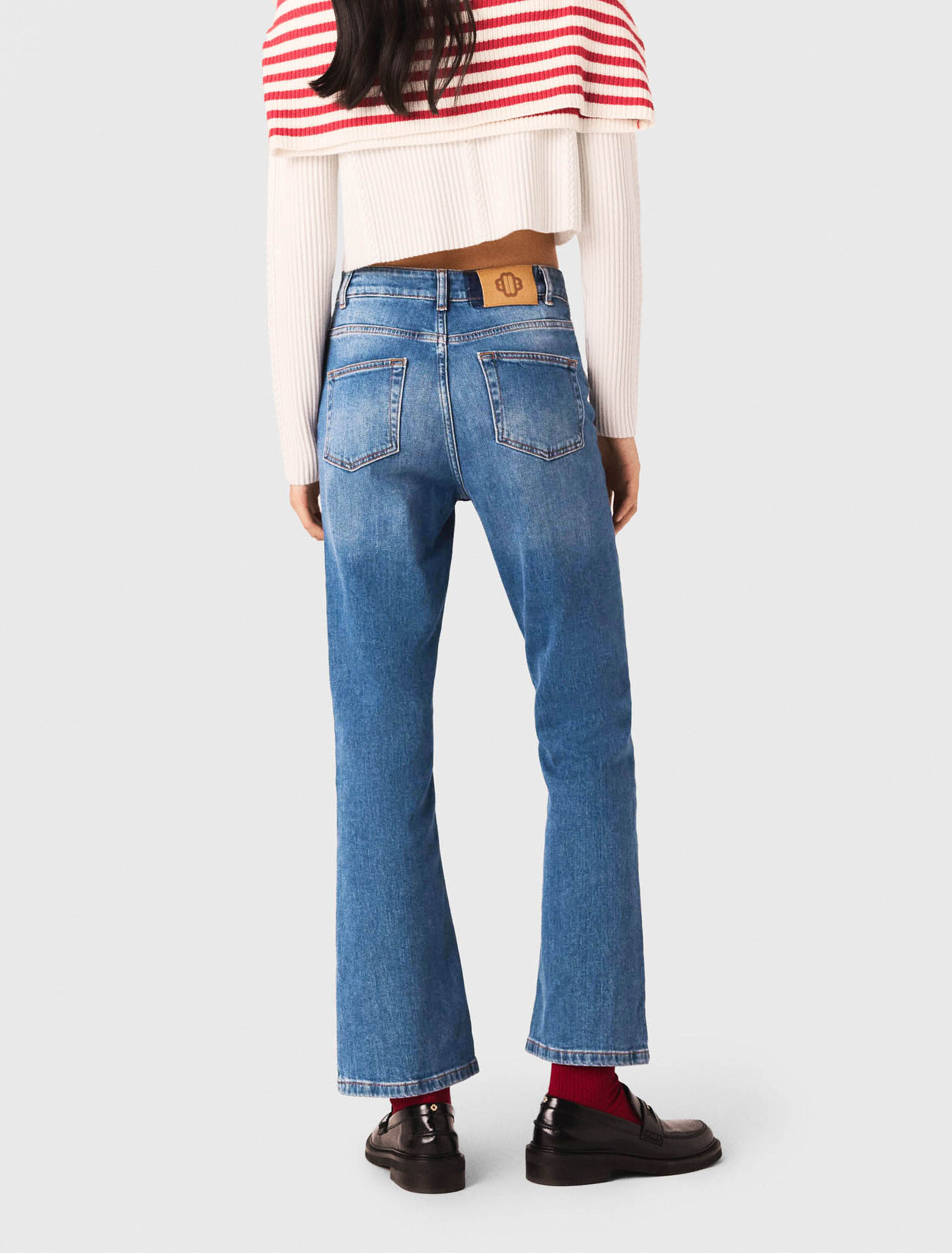 Jeans in denim con tasche