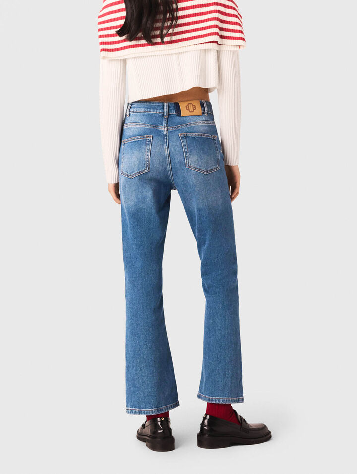 Jeans in denim con tasche