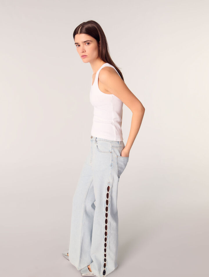 Jeans larghi con cut-out e strass