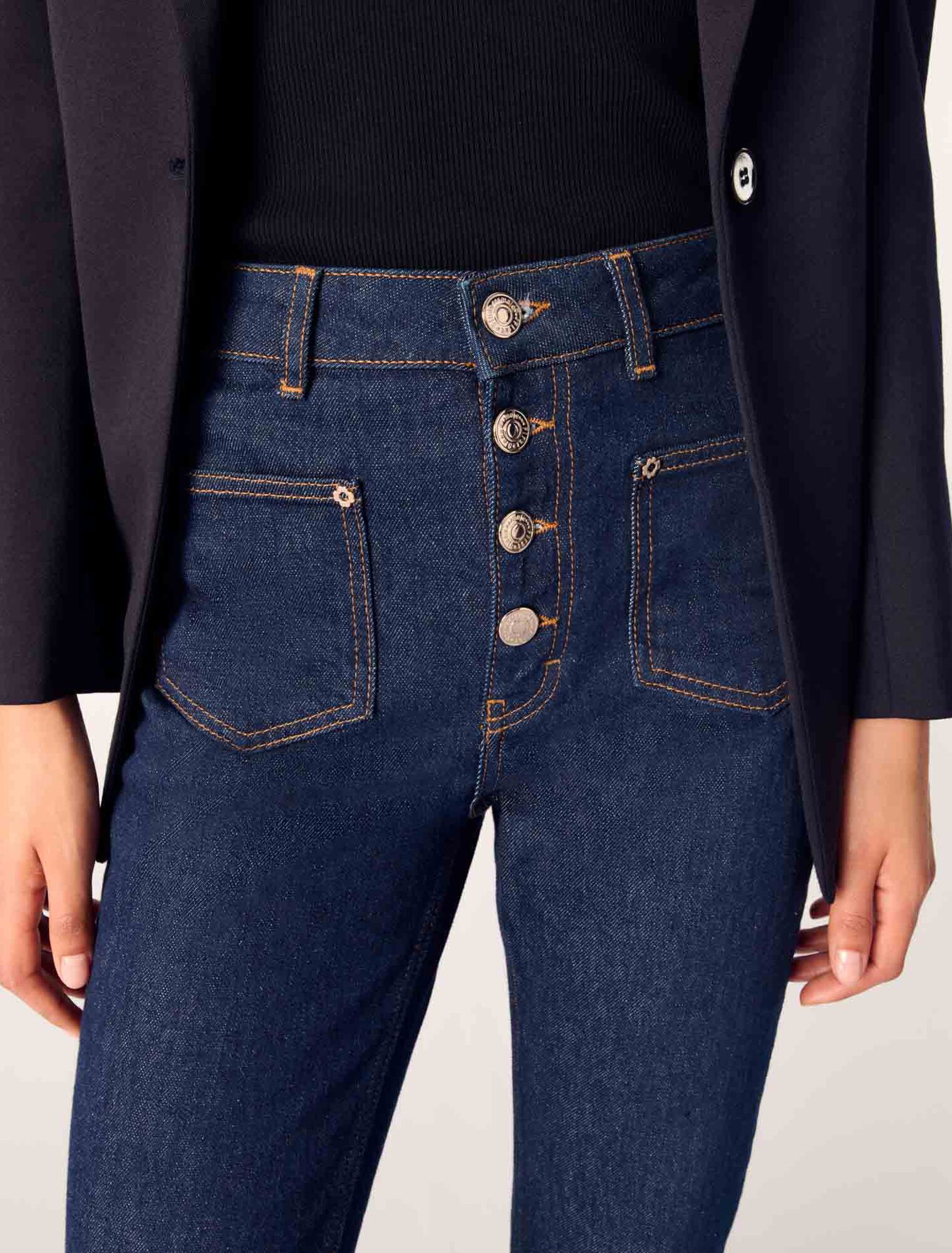 Jeans in denim con tasche