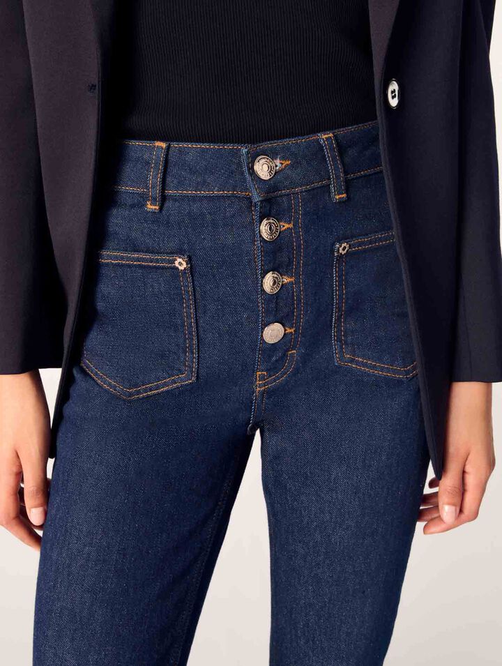 Jeans in denim con tasche