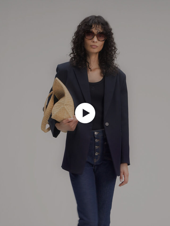 Jeans in denim con tasche