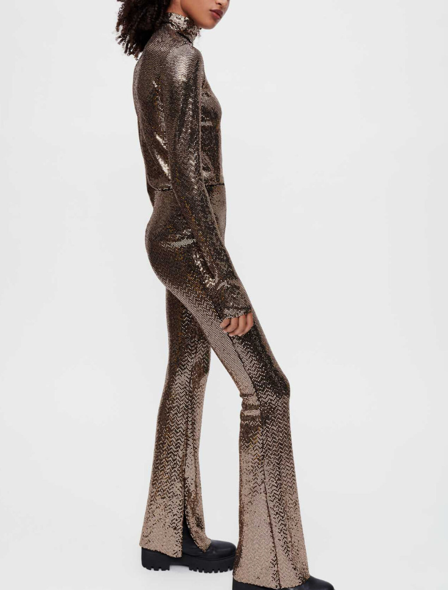 Pantaloni stretch e flare in paillettes