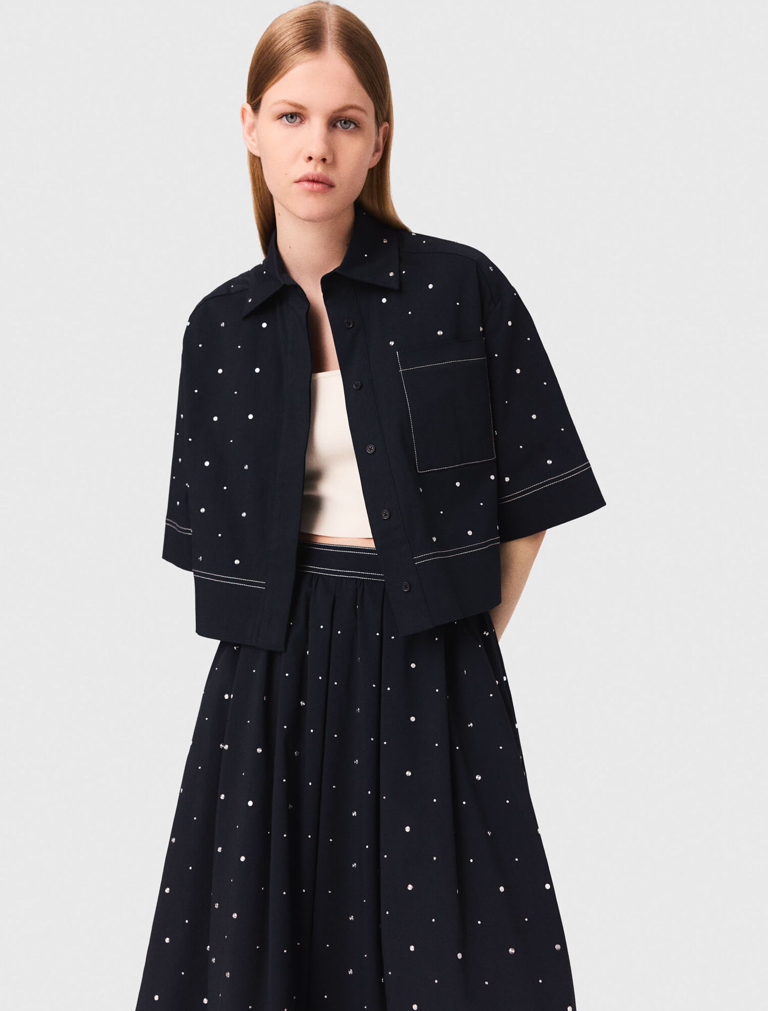 Camicia cropped con borchie