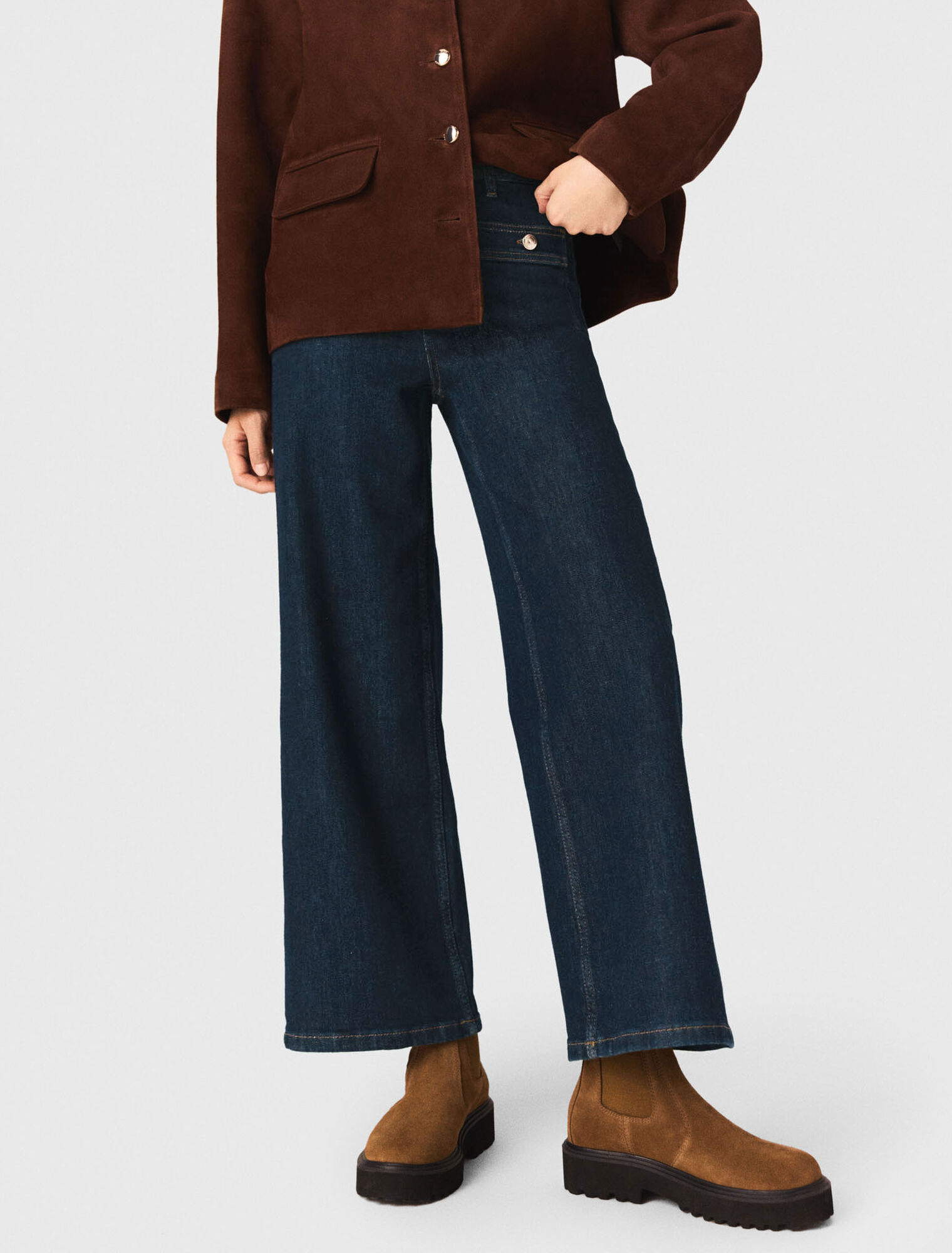 Jeans larghi con tasche applicate