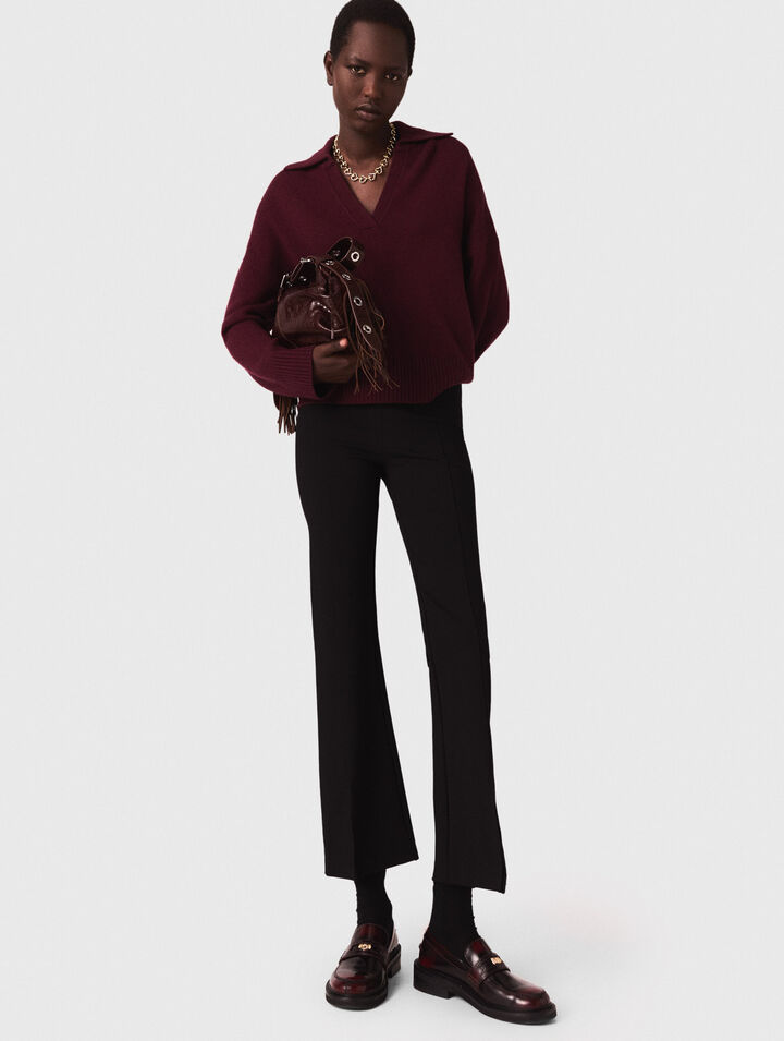 Pantaloni con spacco