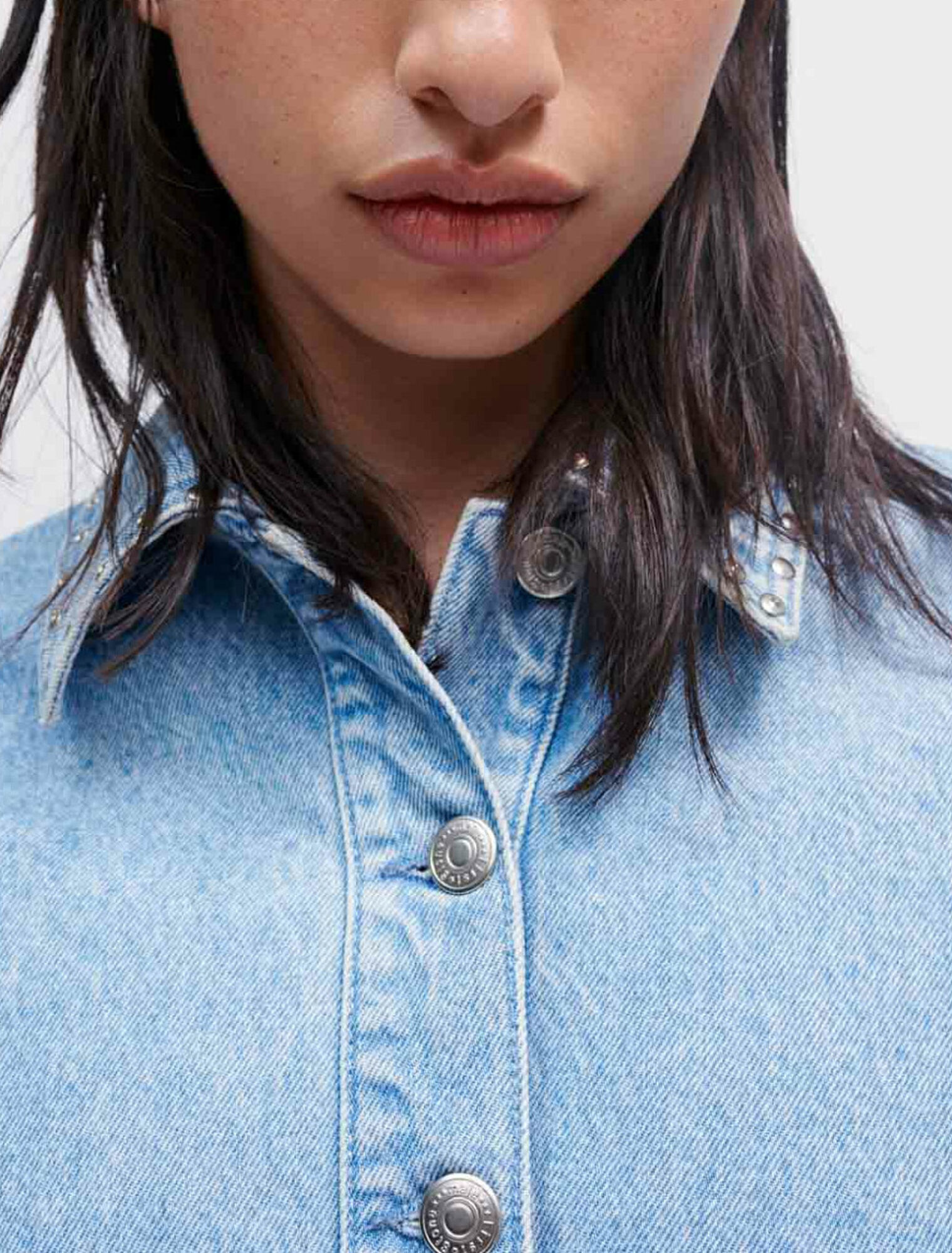 Giacca in denim con borchie