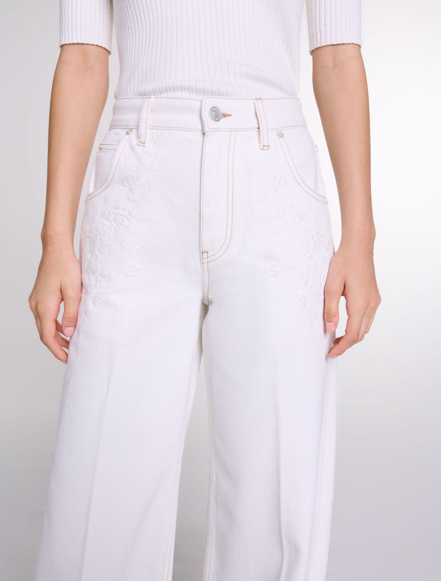 Jeans a gamba larga a vita alta ricamati
