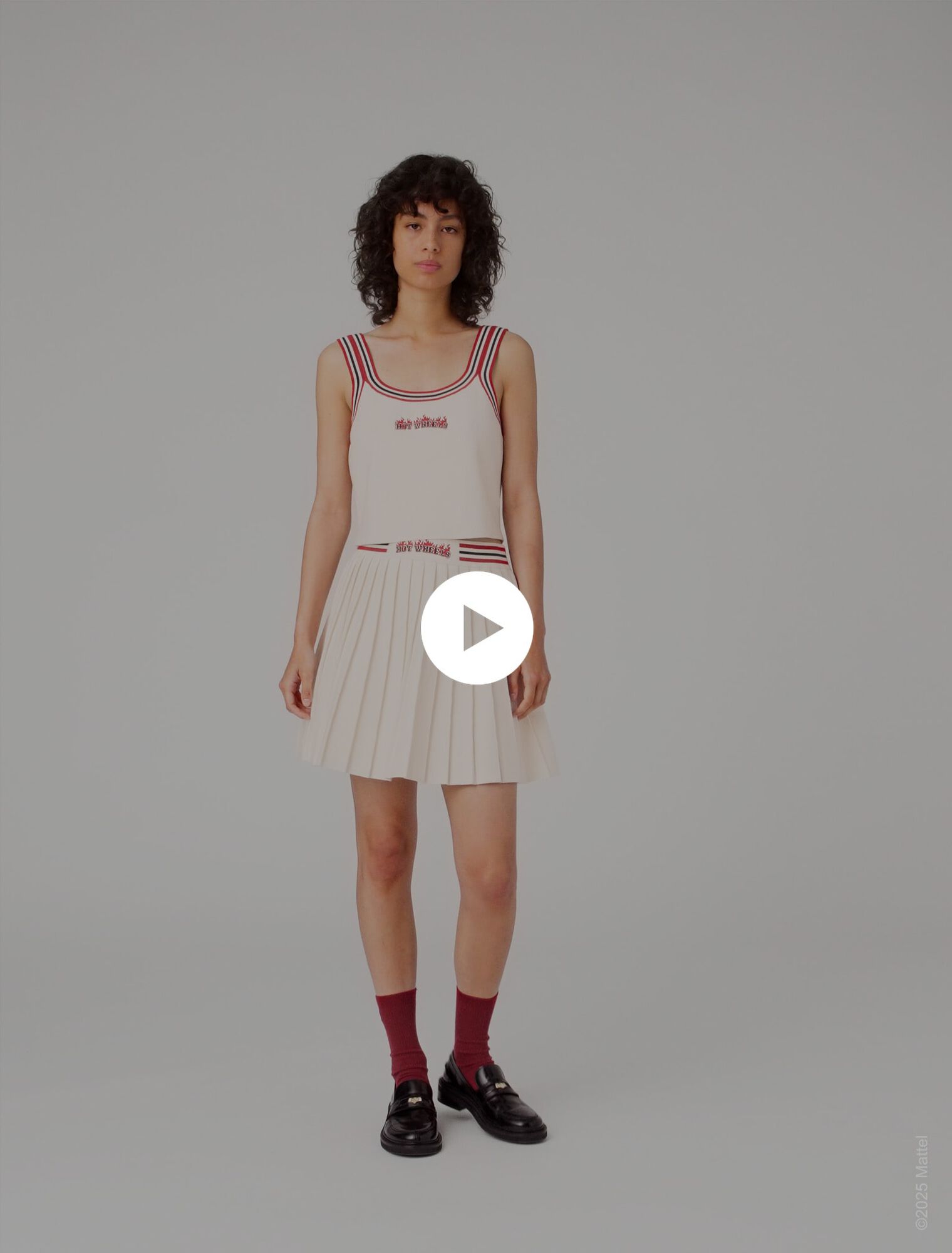 Gonna corta plissettata in maglia