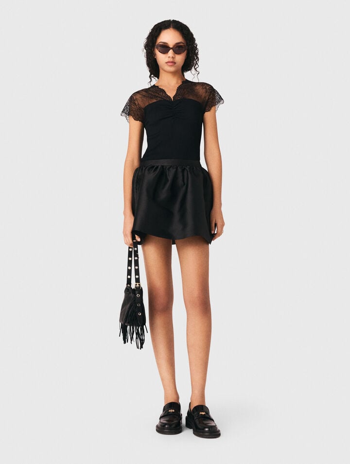 Top in jersey con applicazioni in pizzo