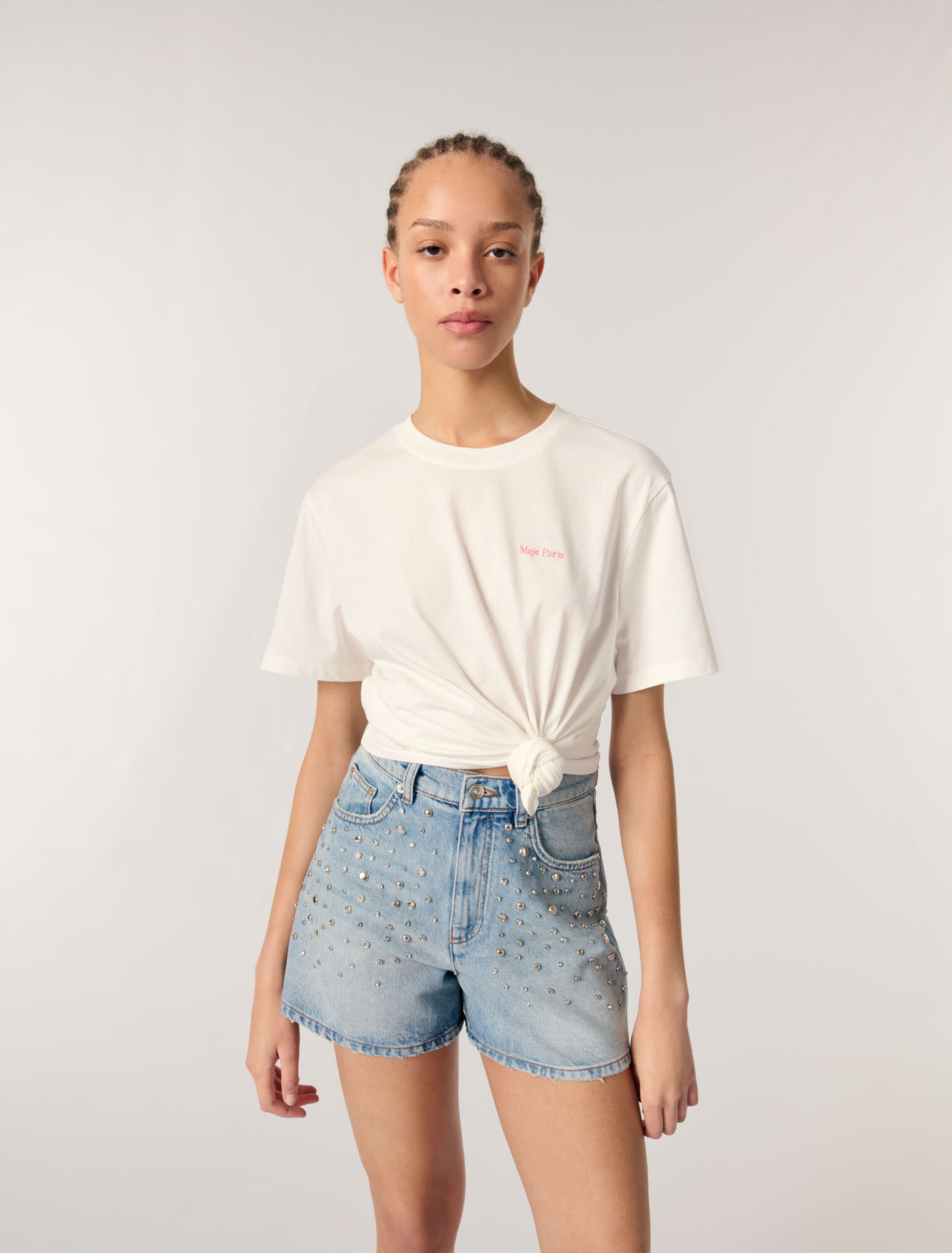 Shorts in denim con borchie