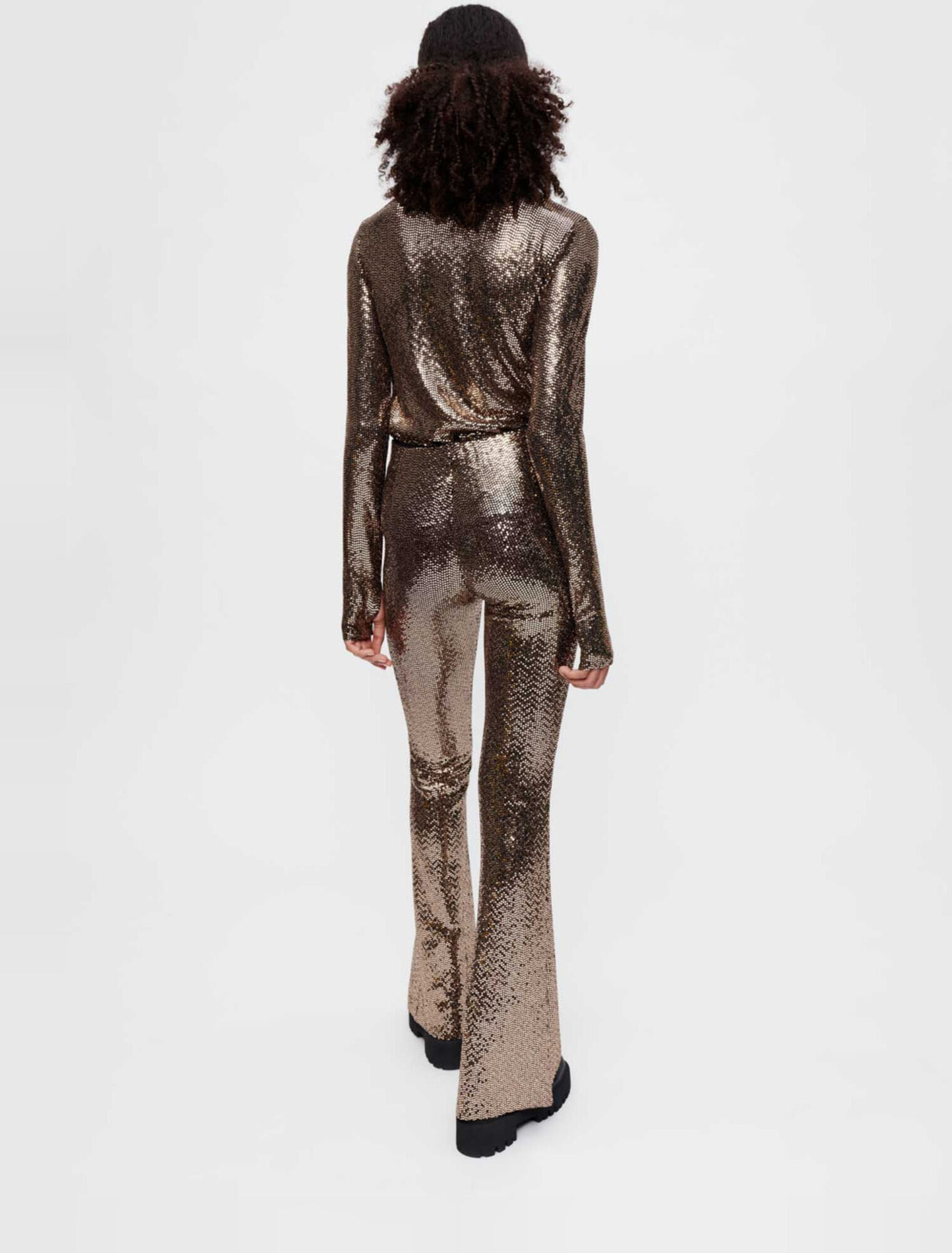 Pantaloni stretch e flare in paillettes