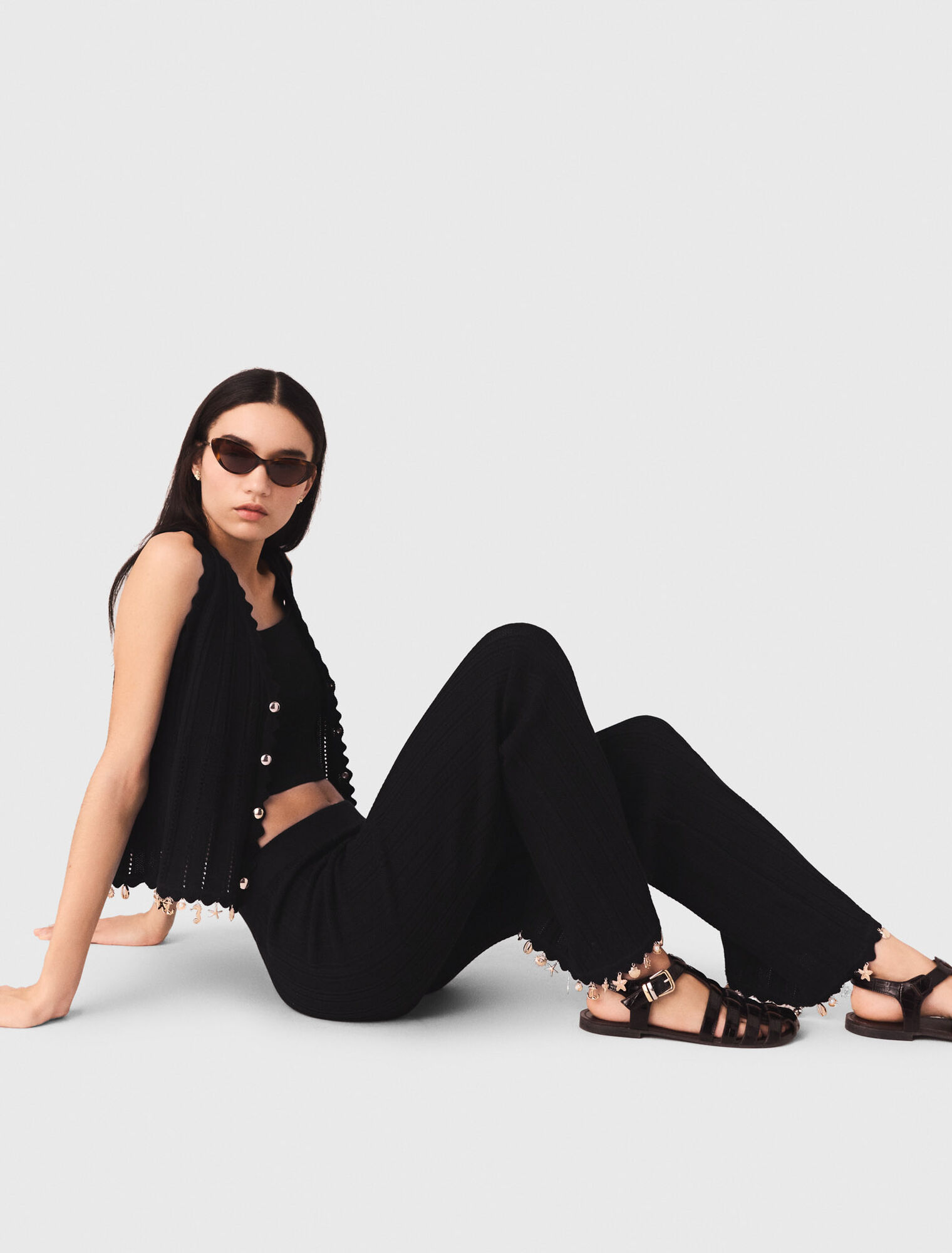 Pantaloni in maglia con gioielli