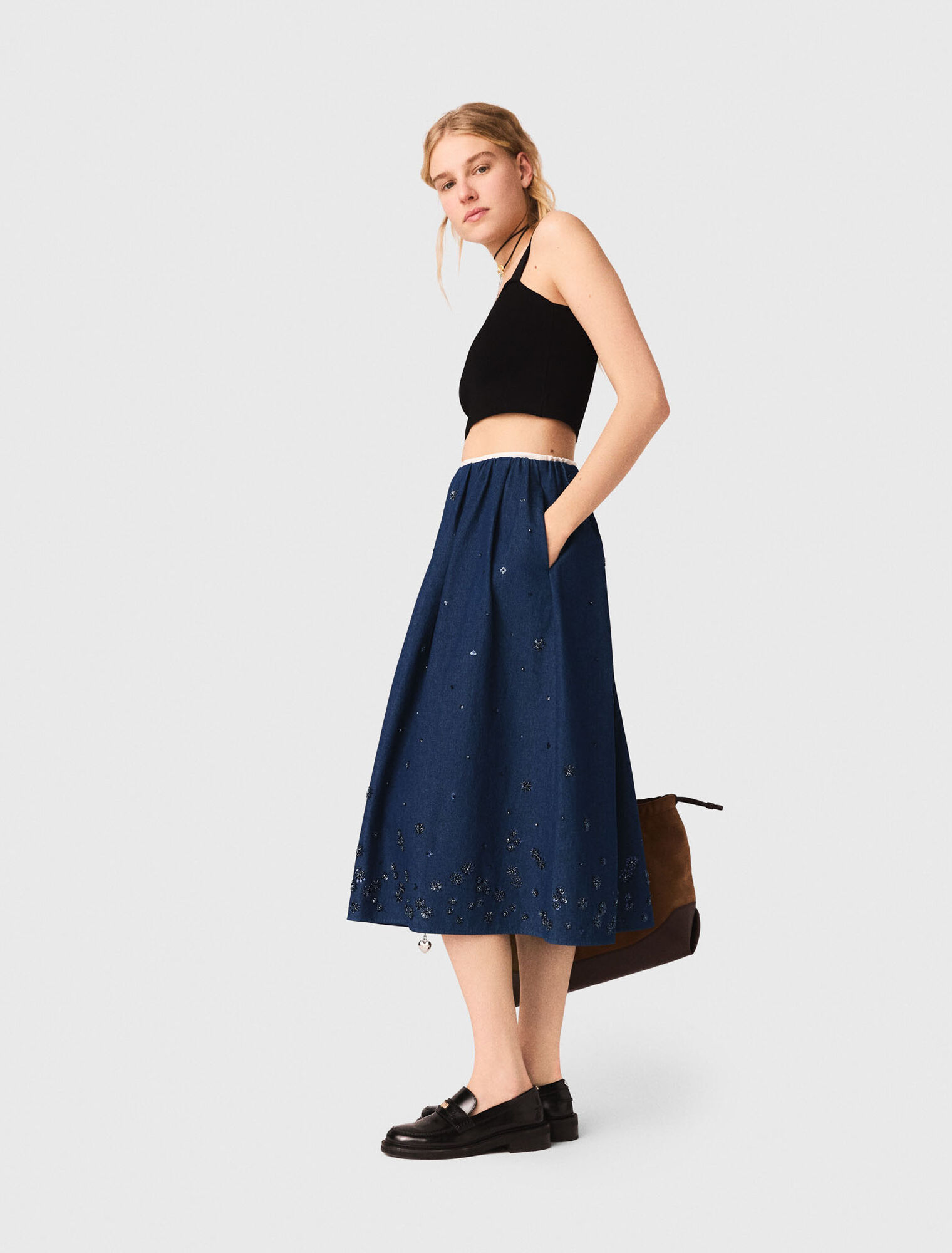 Top crop in maglia con spalline