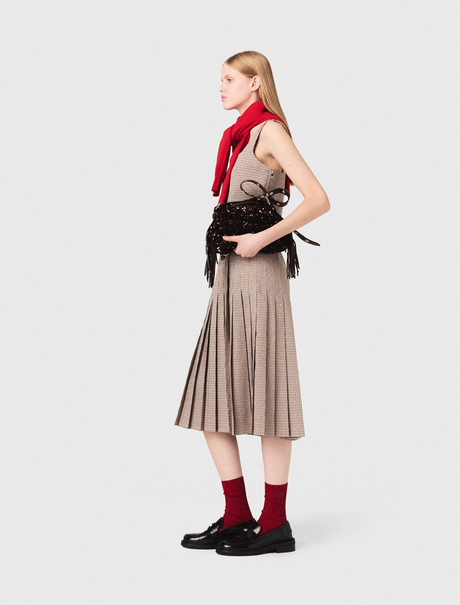Top a quadri con strass e spalline