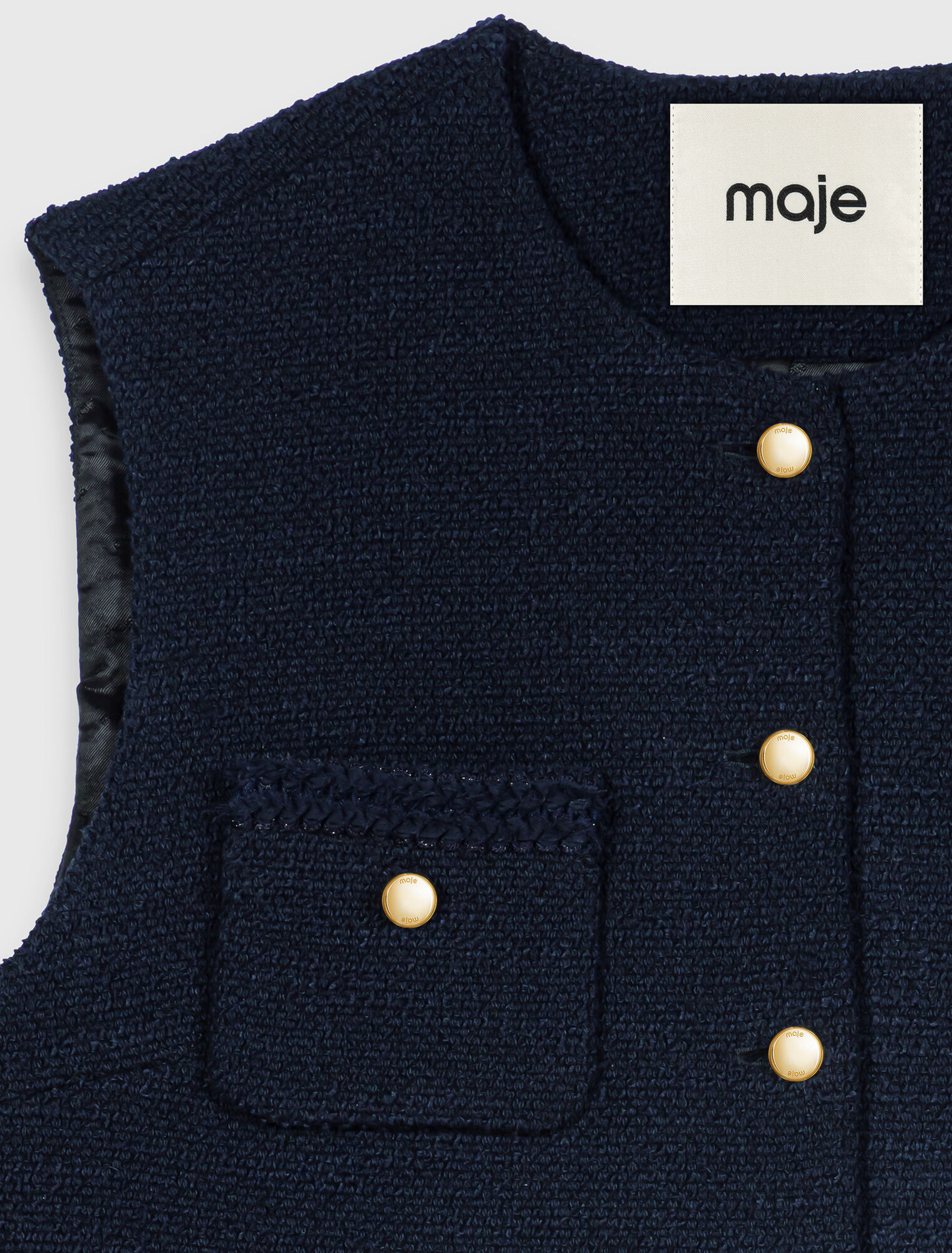 Giacca in tweed senza maniche
