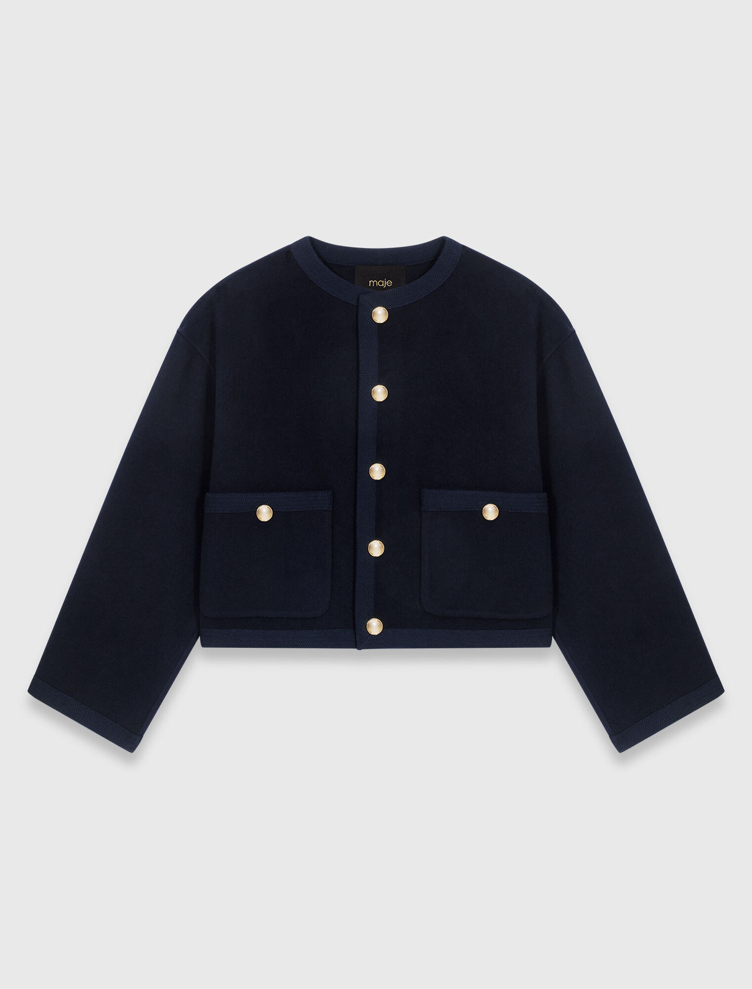 Giacca double face, bordi a treccia