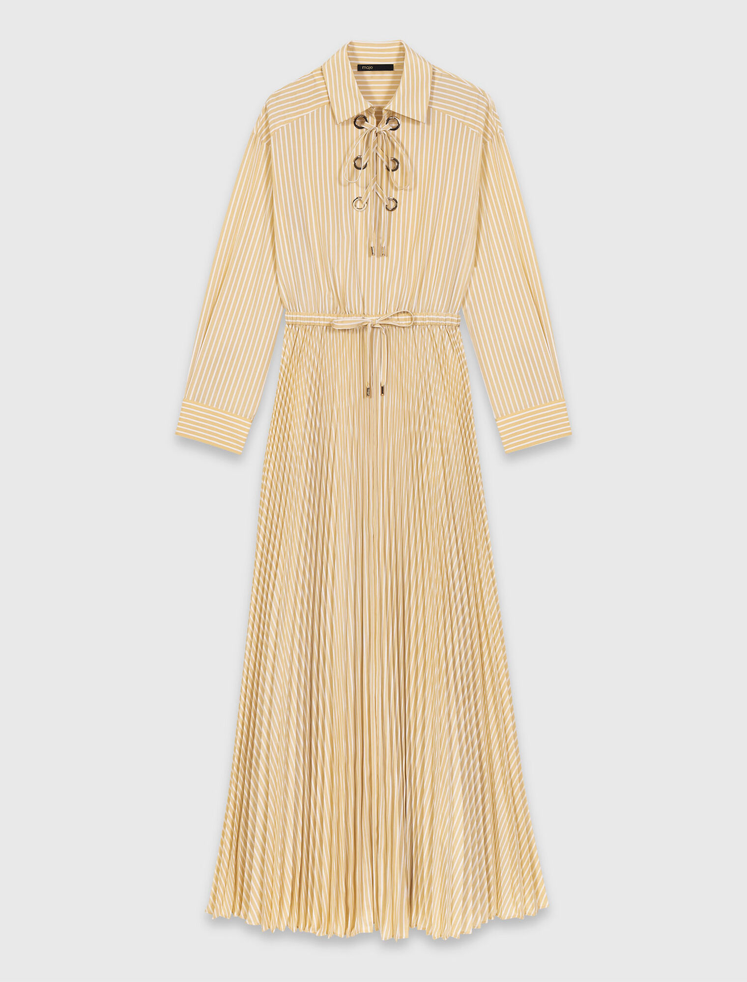 Abito lungo pliss&eacute; con occhielli