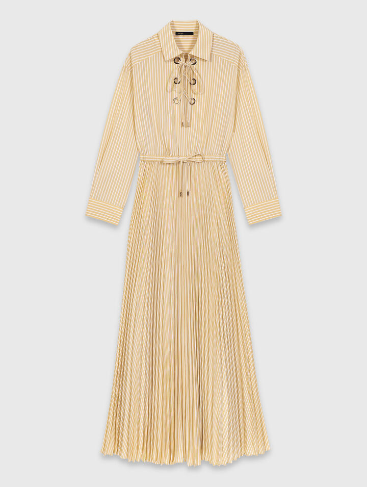 Abito lungo pliss&eacute; con occhielli