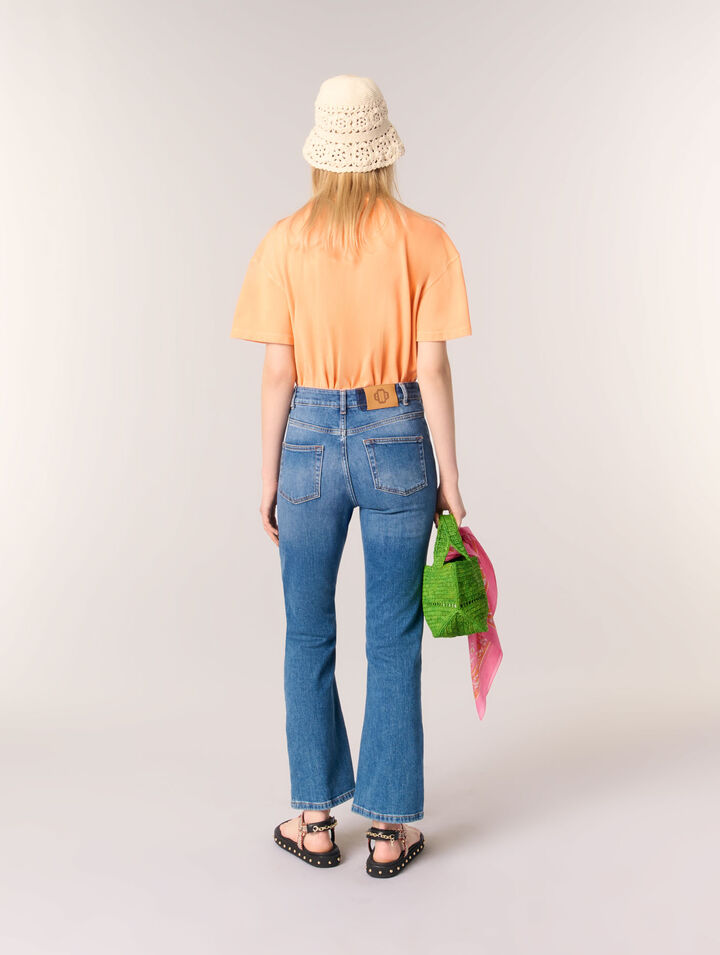 Jeans in denim con tasche