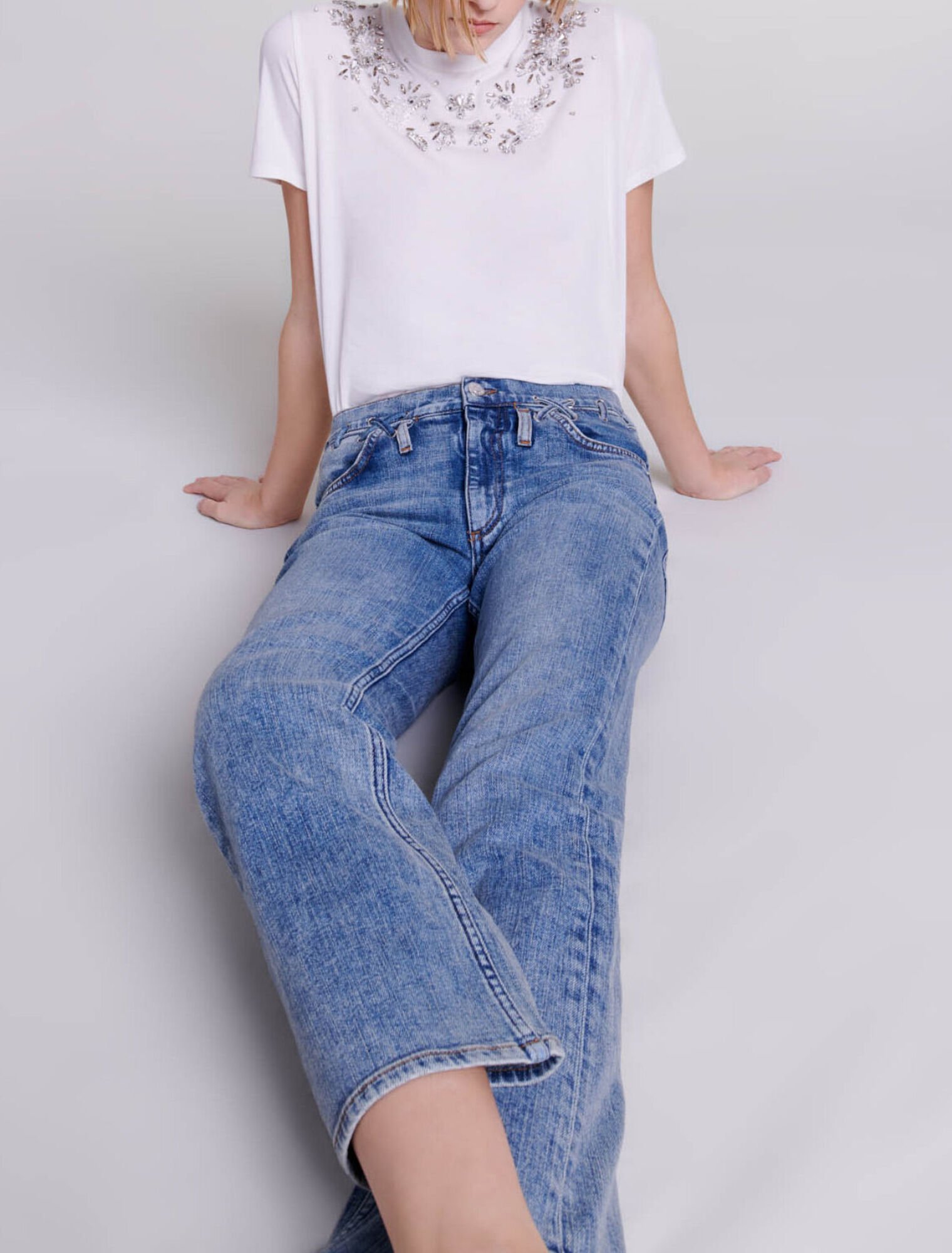 Jeans con dettagli intrecciati