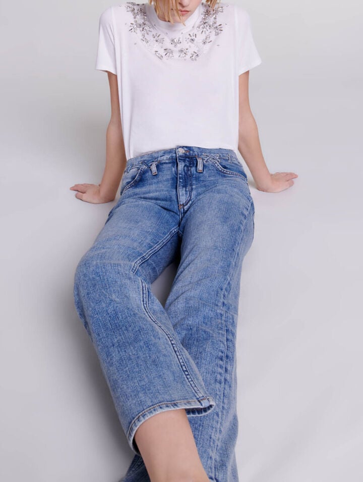 Jeans con dettagli intrecciati