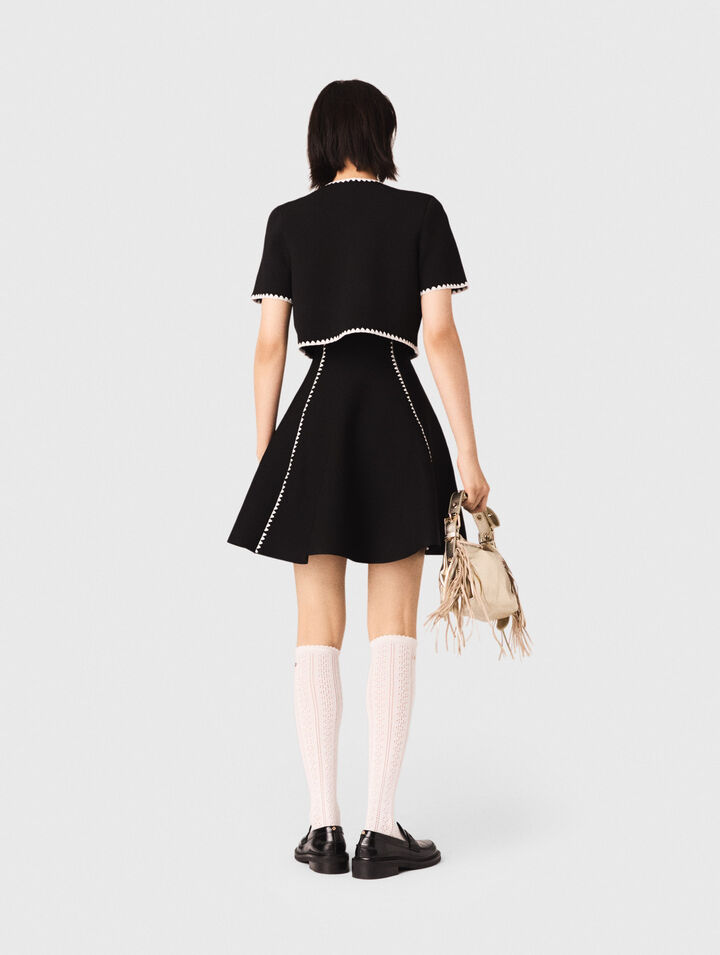 Cardigan corto con impunture