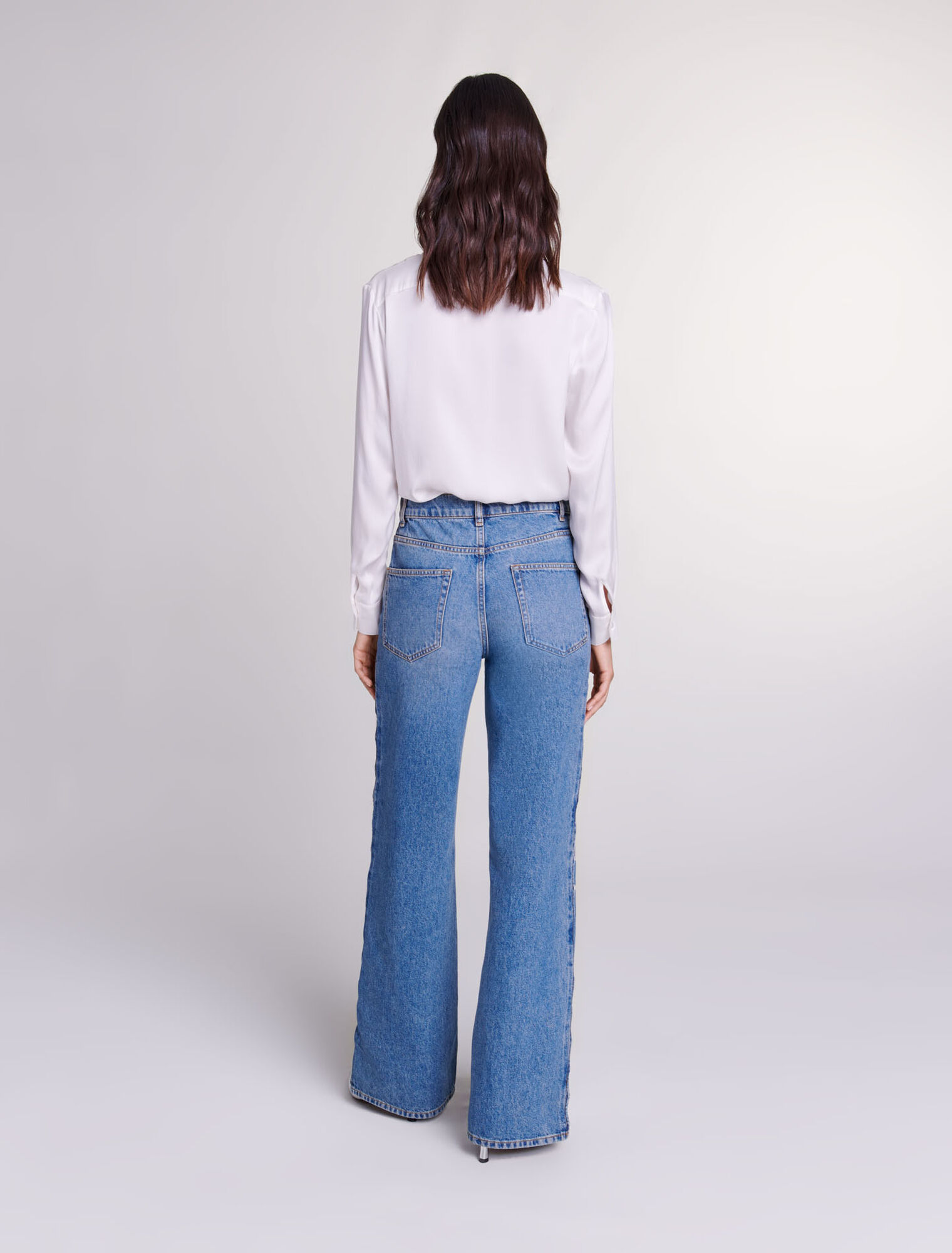 Jeans dritti traforati con perline