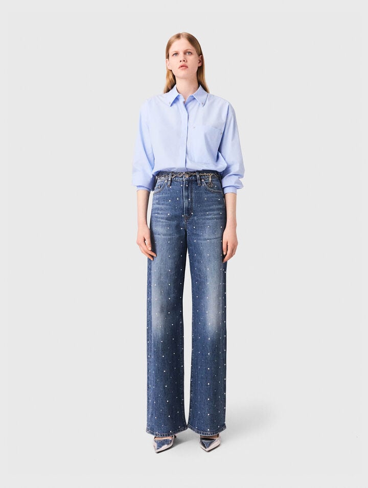 Jeans larghi in denim con borchie