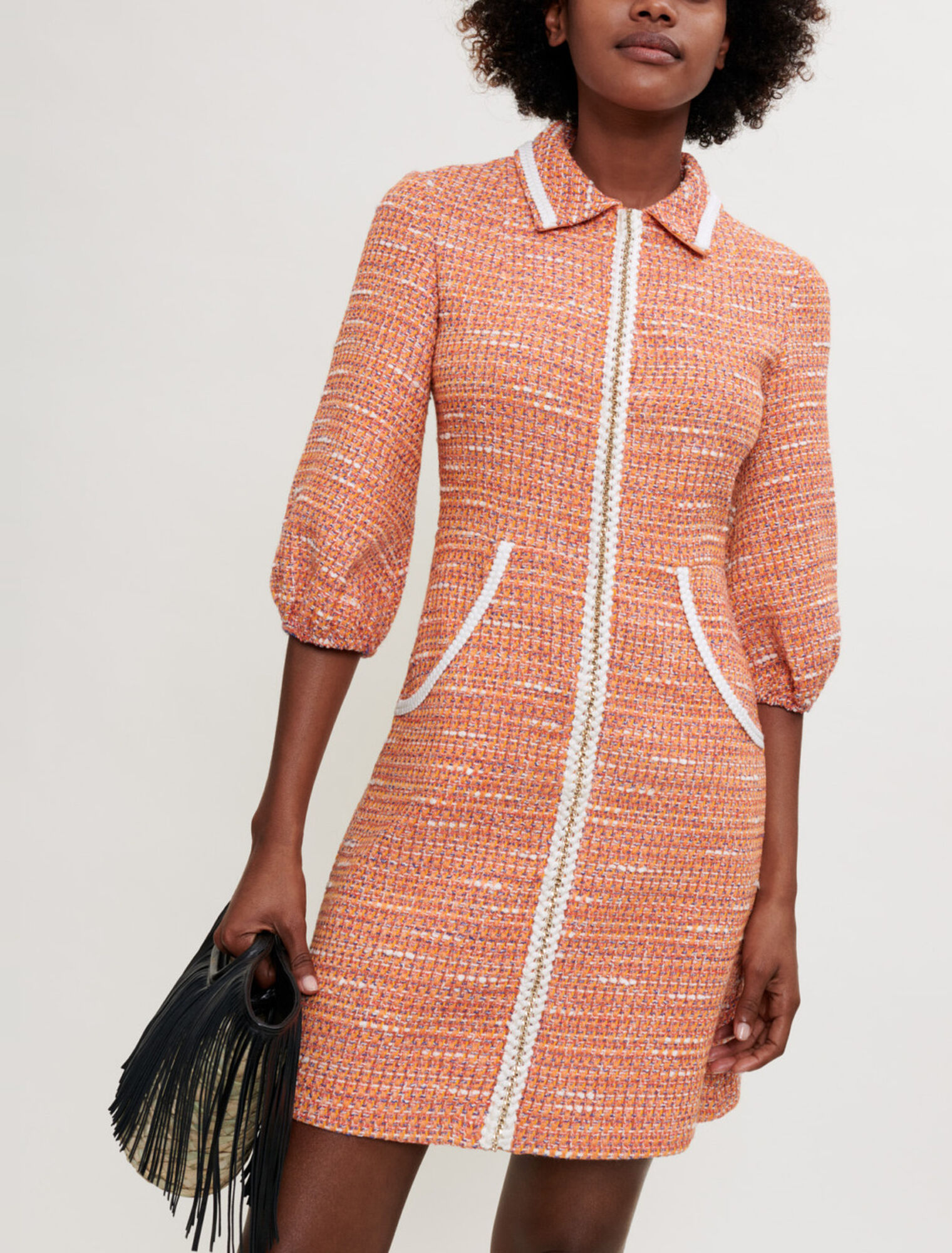 Abito in tweed con trecce