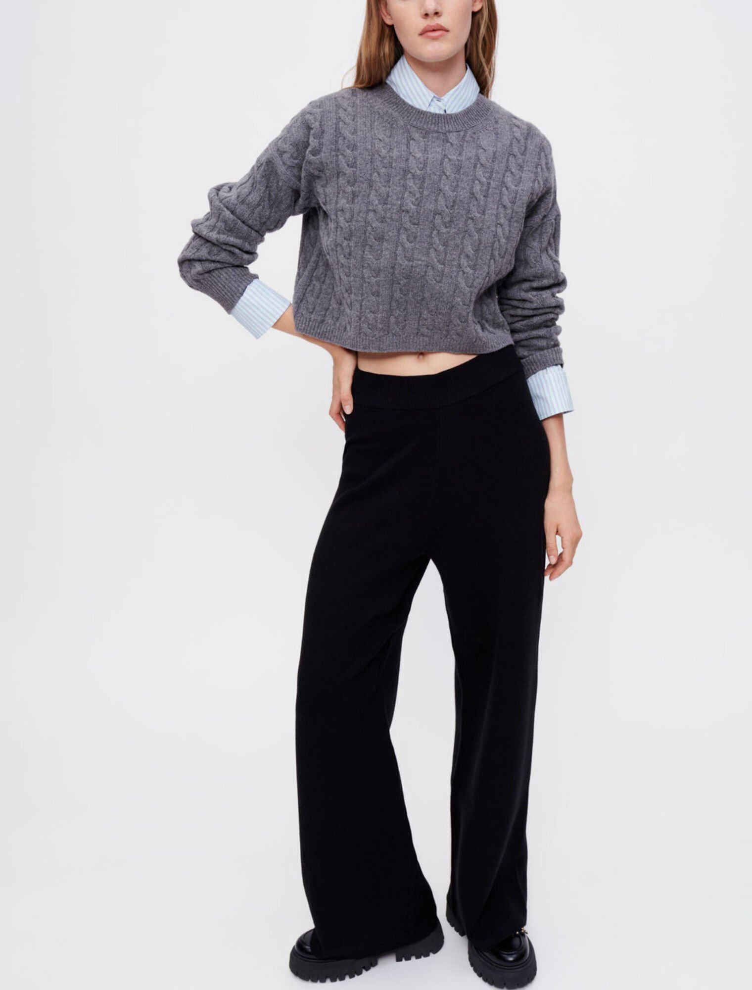 Pantaloni neri a gamba larga in maglia