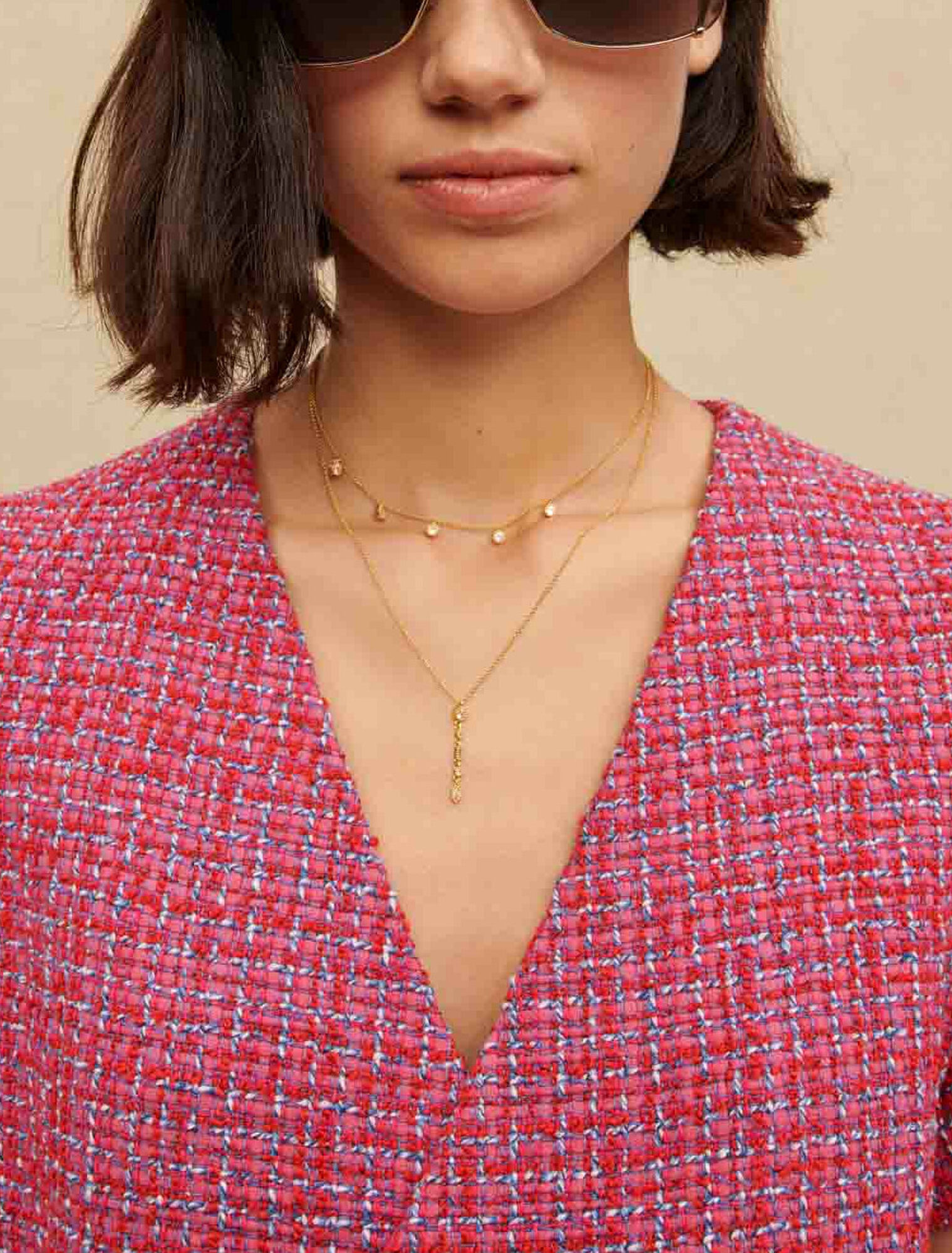 Abito corto in tweed con schiena