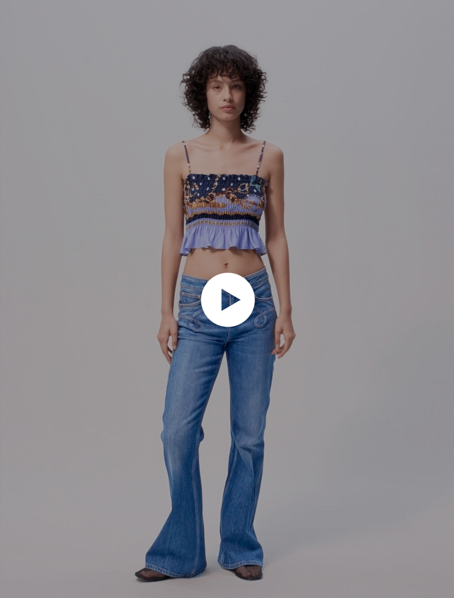 Jeans flare con tasche ricamate