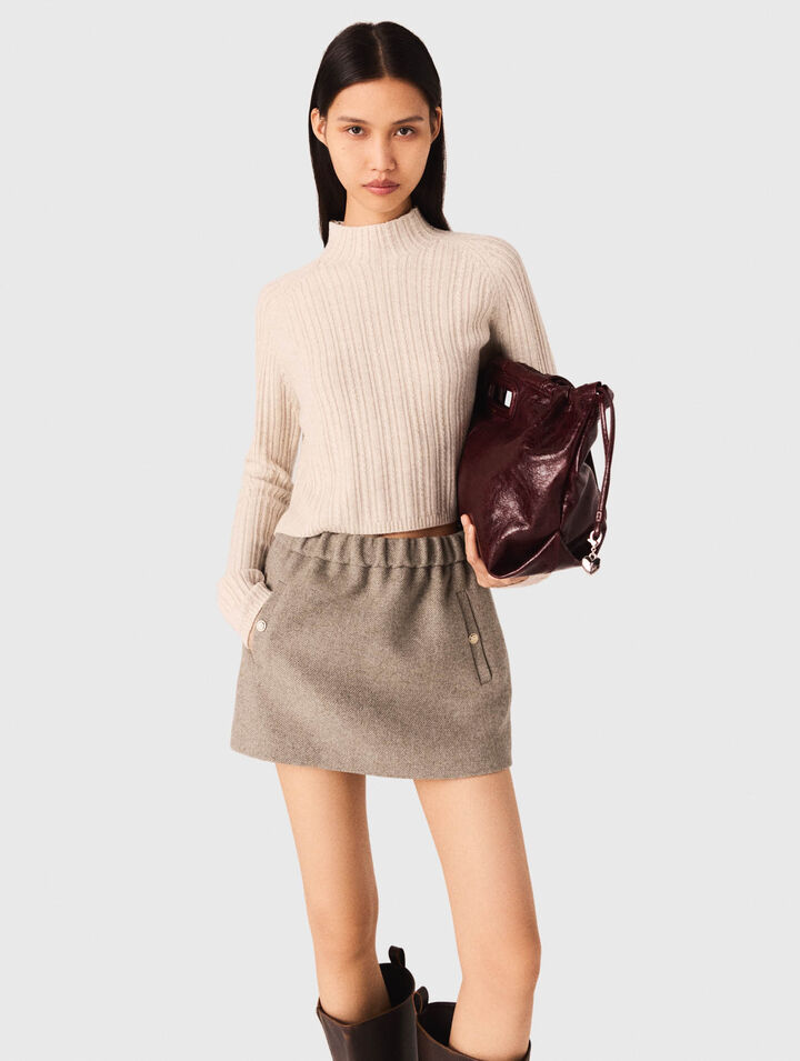 Maglione corto in maglia a trecce
