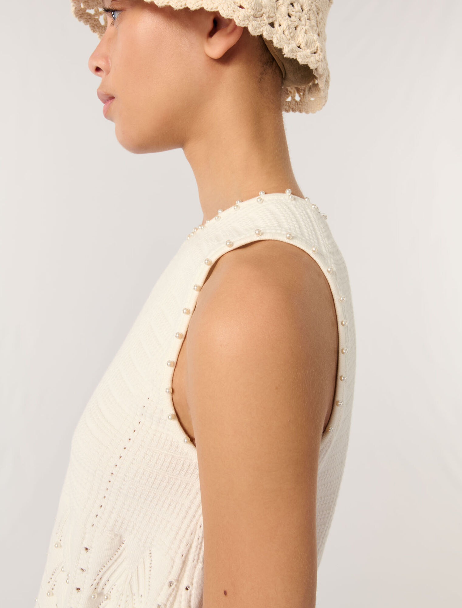 Top in maglia pointelle con perle