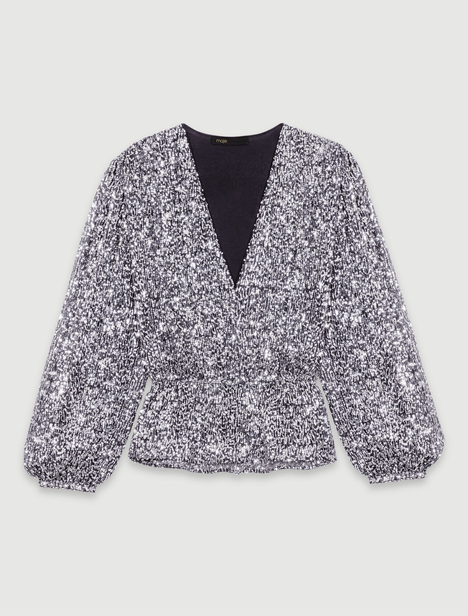 Top a punto smock con lustrini