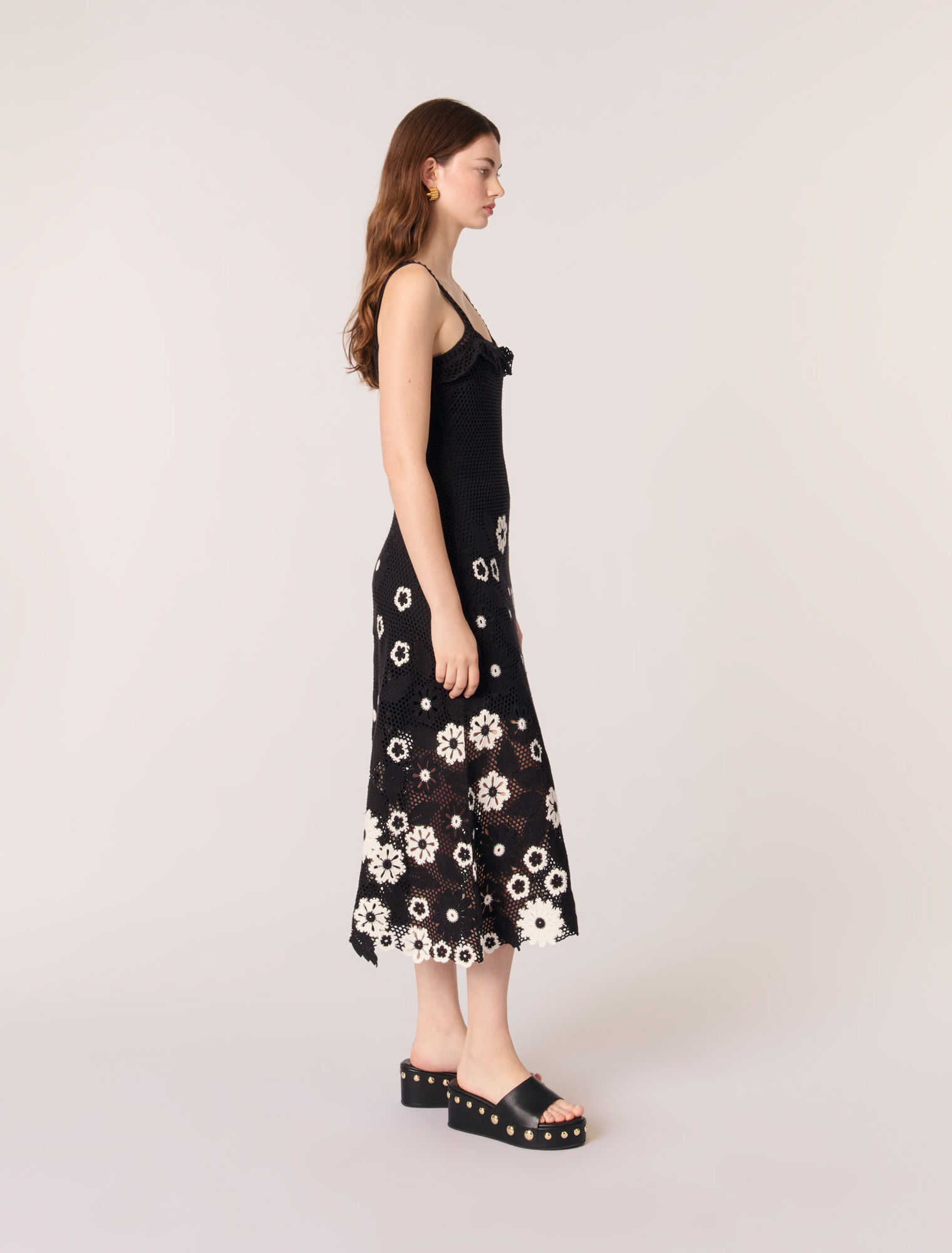 Mules con zeppa in pelle e borchie