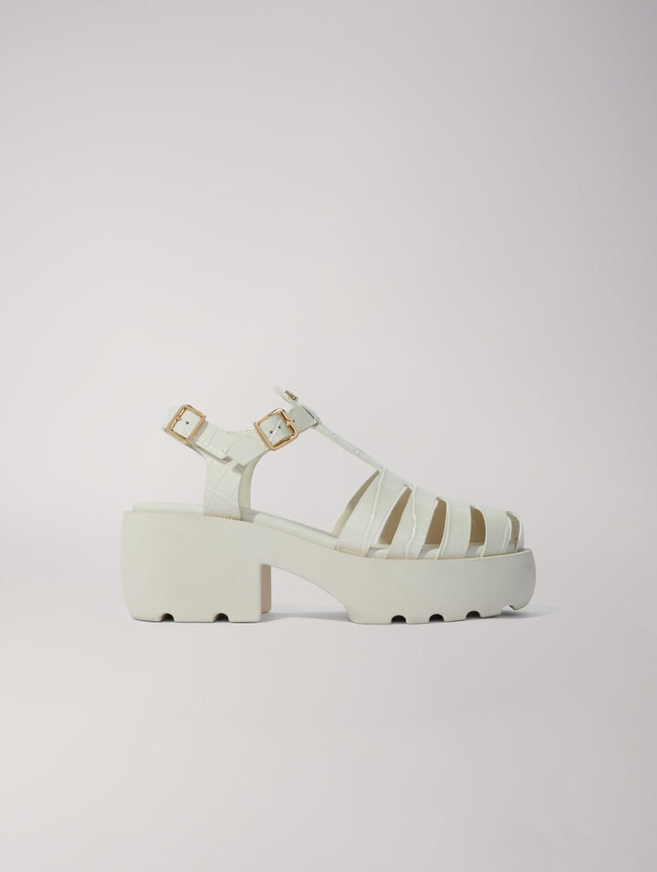 Sandali dentellati in pelle