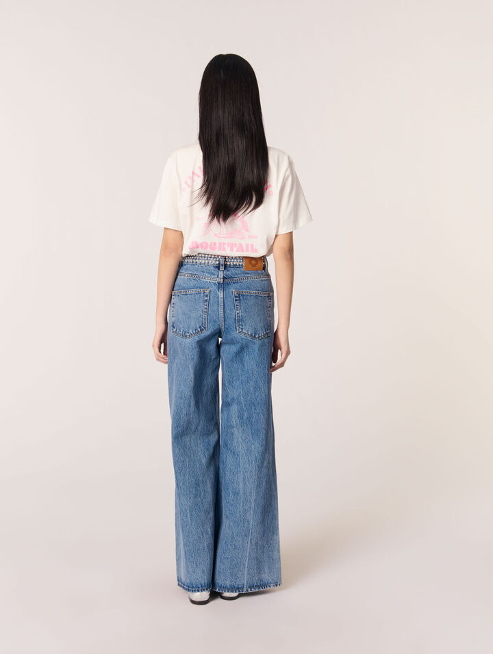 Jeans flare con vita borchiata