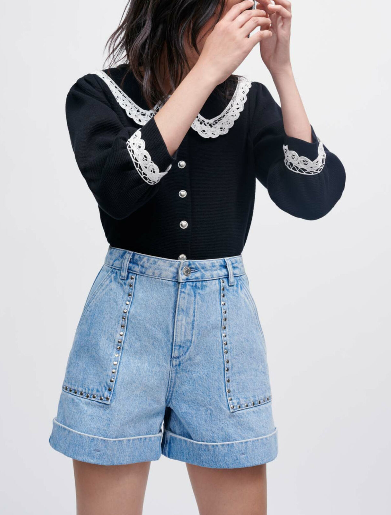 Pantaloncini in denim con borchie