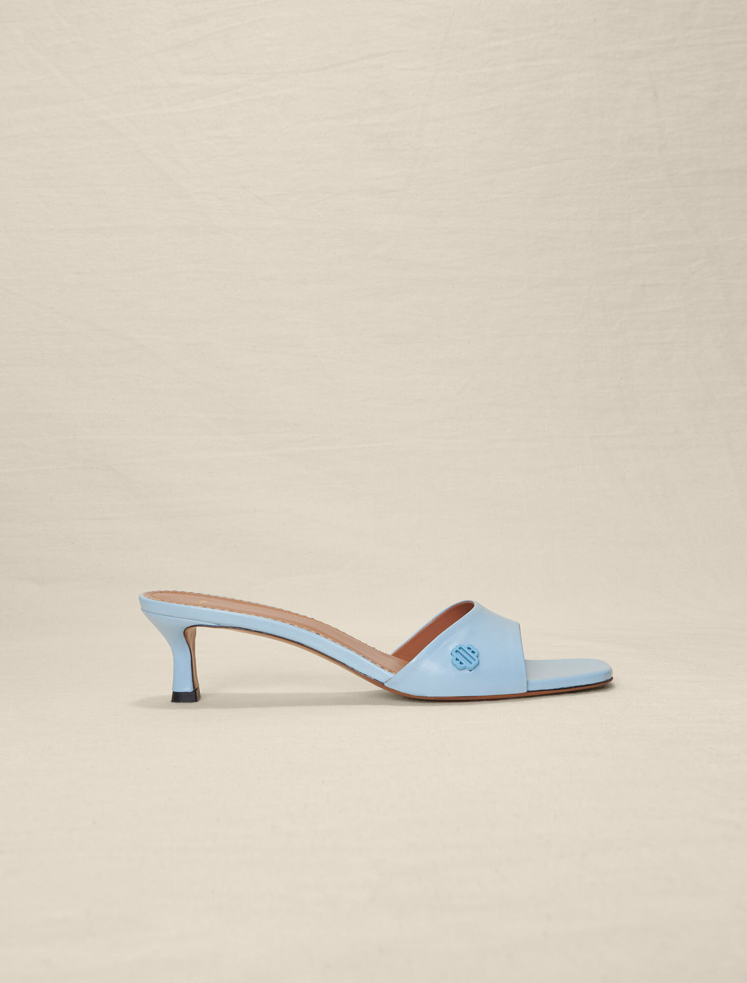 Mules in pelle