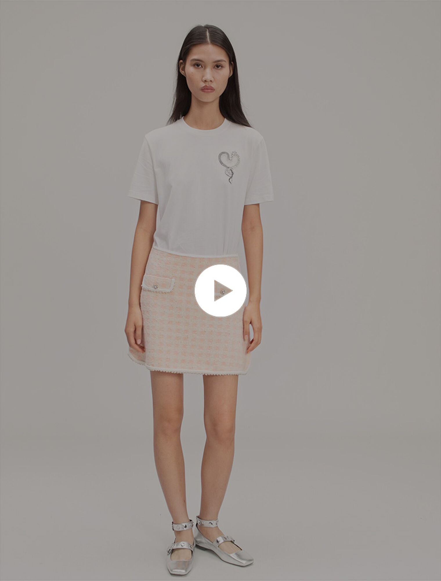 Gonna corta in maglia effetto tweed