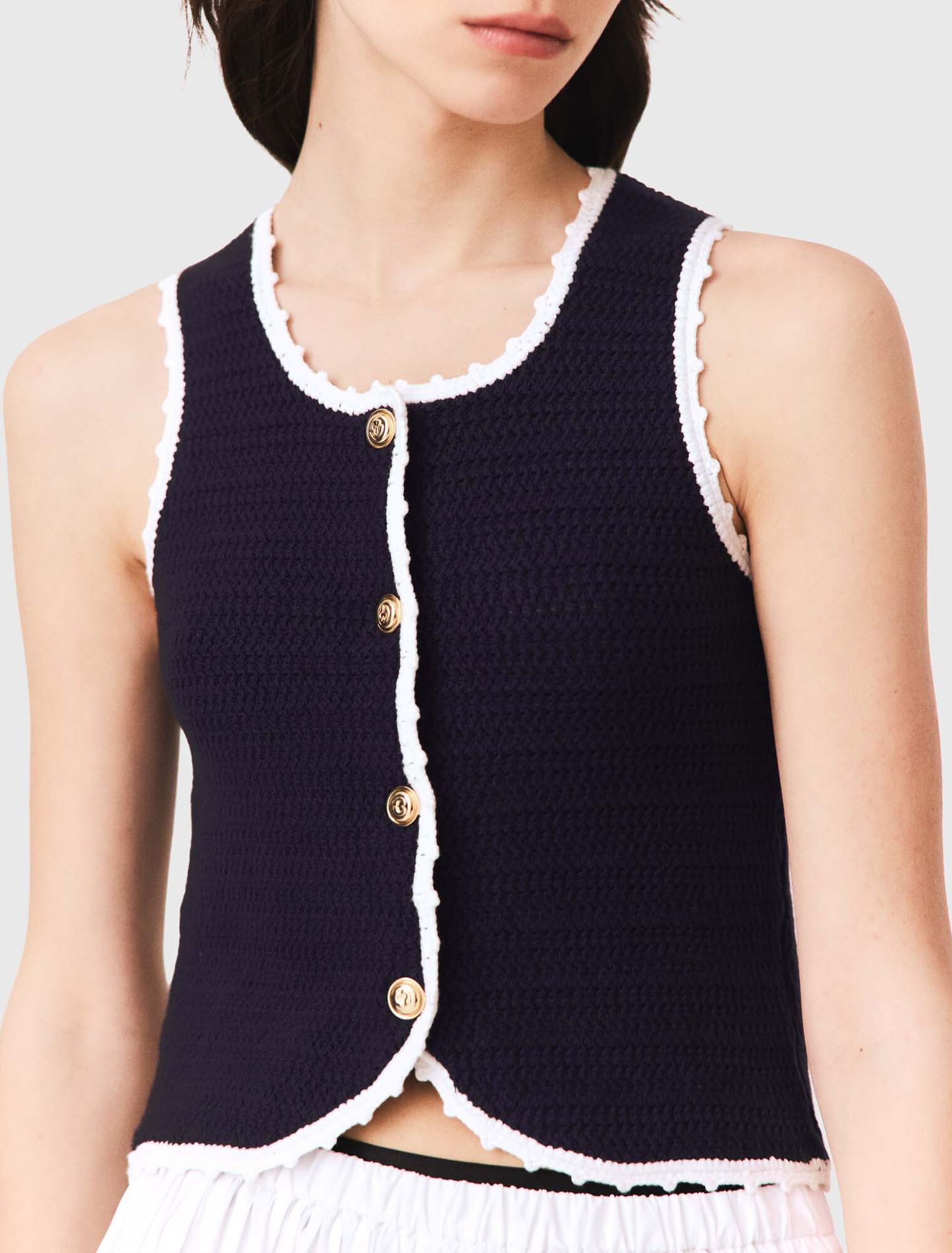 Top in maglia con finiture crochet