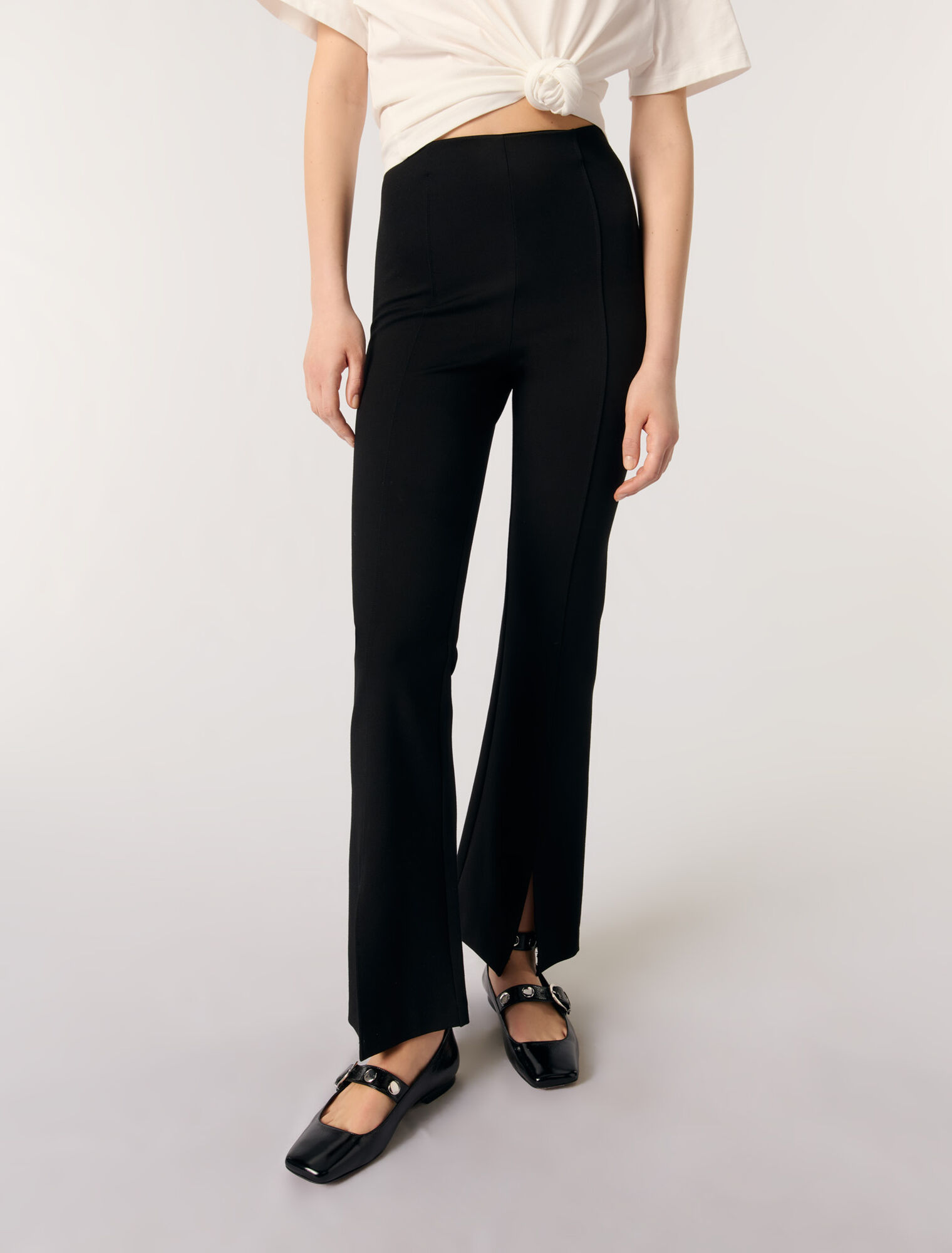 Pantaloni con spacco