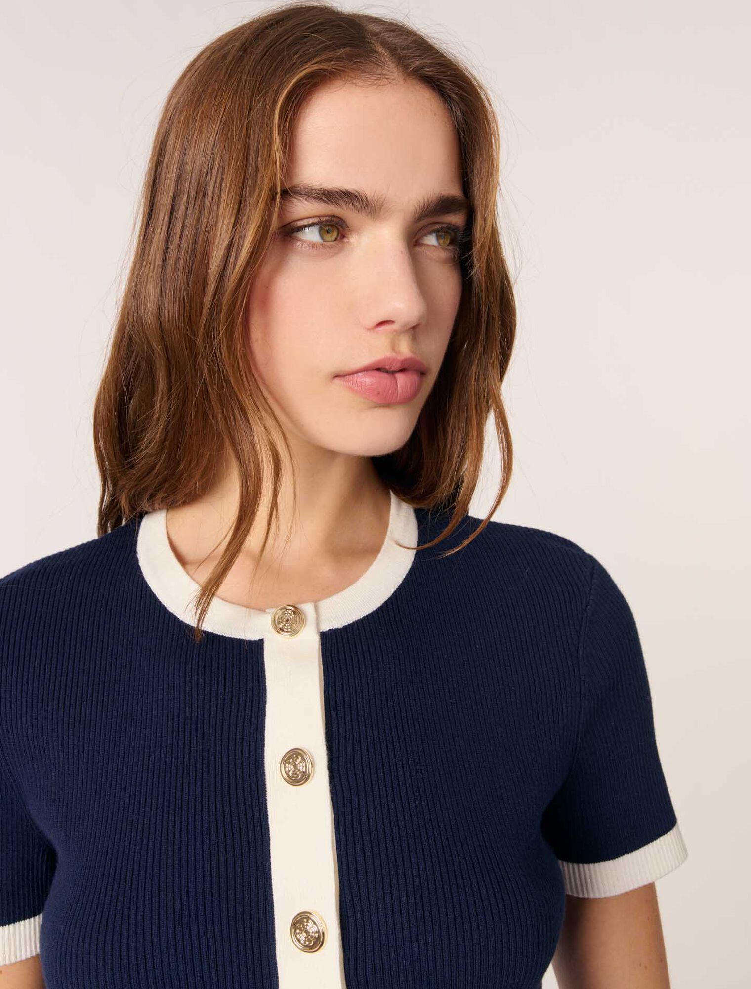 Cardigan corto dettagli a contrasto