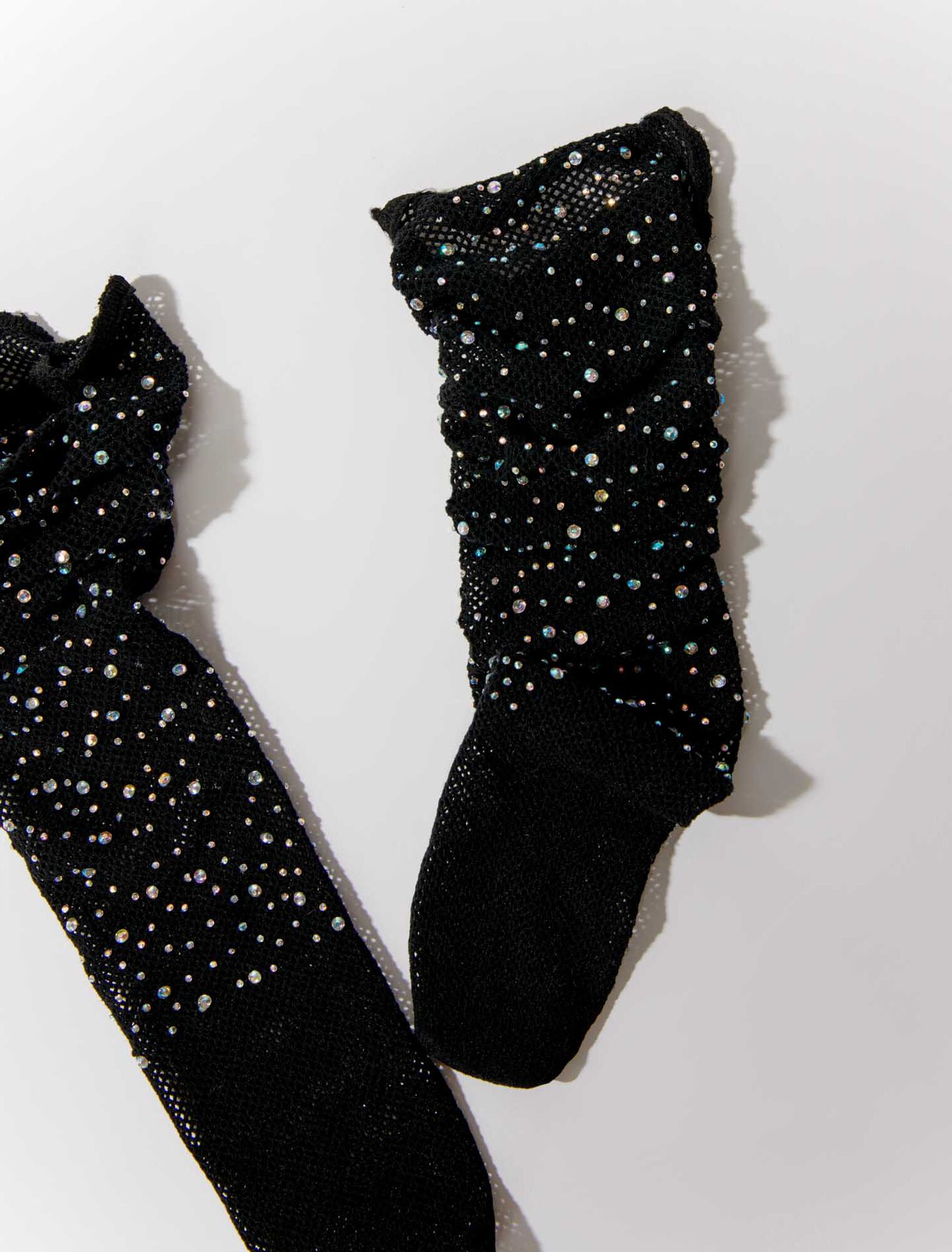 Calze a rete glitterate