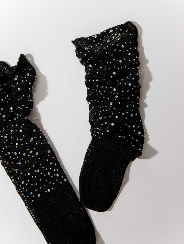 Calze a rete glitterate