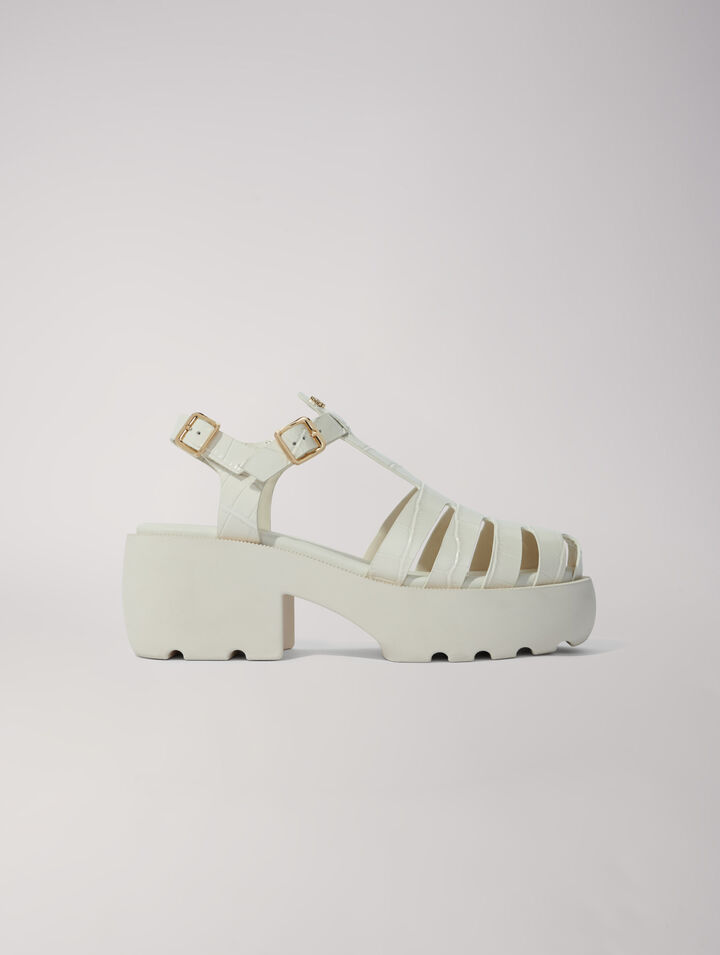 Sandali dentellati in pelle