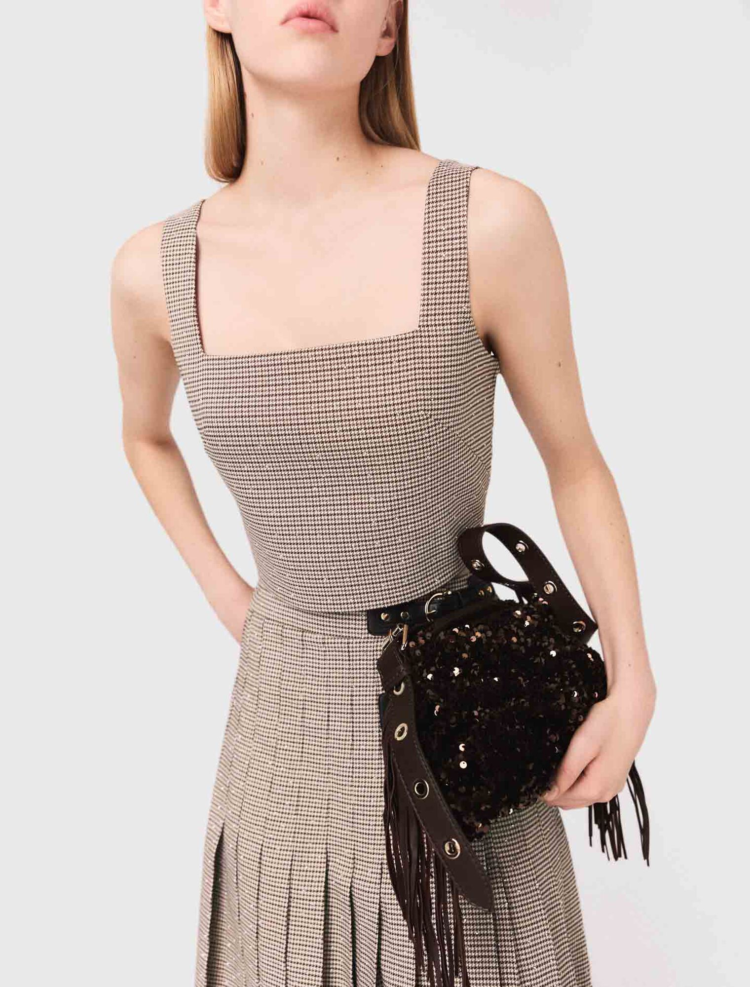 Top a quadri con strass e spalline
