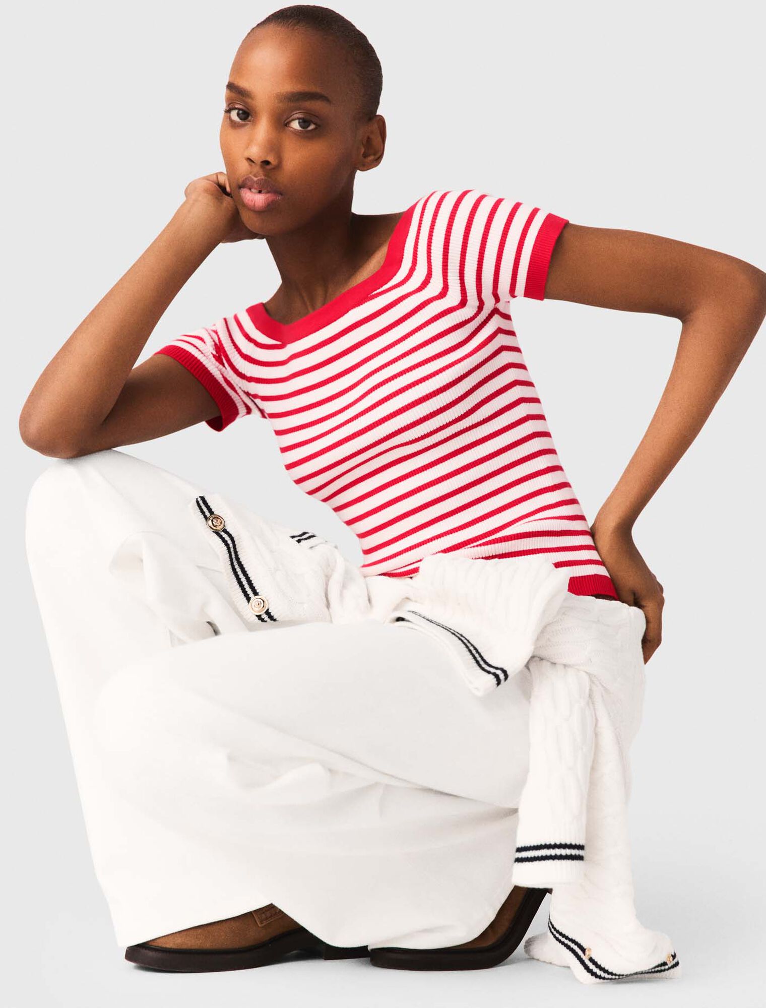 Top maglia a righe scollo a barca